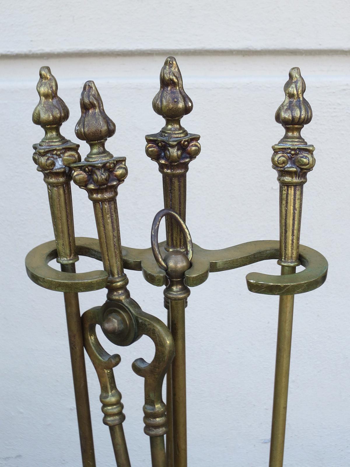 19th-20th Century Neoclassical Brass Four-Piece Fire Tool Set with Flame Finials In Good Condition In Atlanta, GA