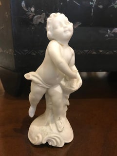 19th-20th Century Porcelain Putti Figure