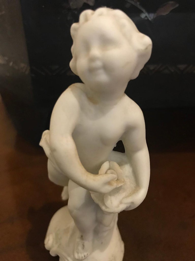 19th-20th Century Porcelain Putti Figure For Sale at 1stDibs