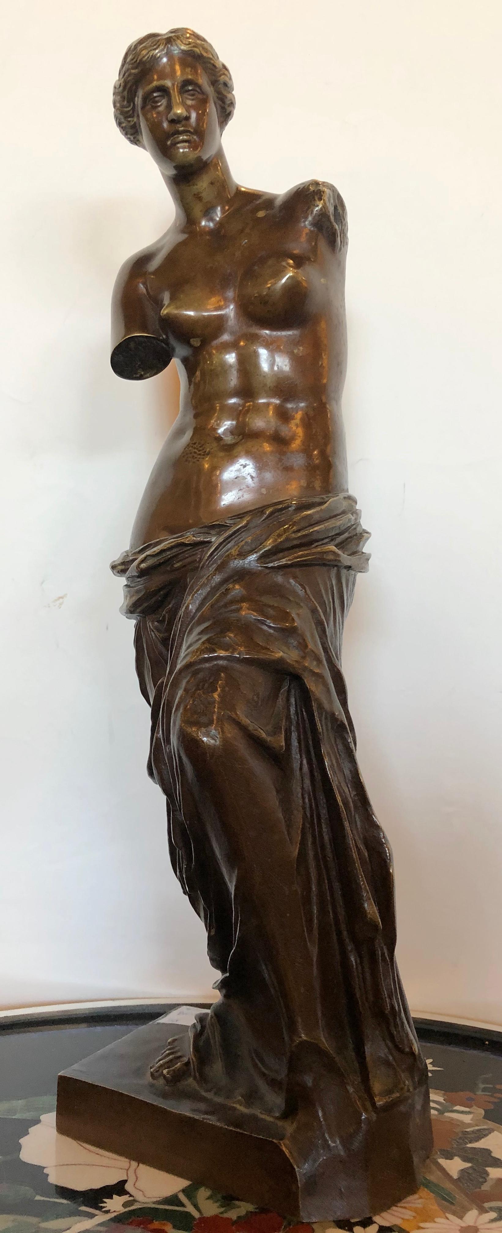 Ron Sauvage signed bronze statue of the Venus de Milo, France, early 20th century. This large and impressive cast bronze, hand finished with antique finish. This statue is reproduction of the famous Venus de Milo now in the Louvre Museum in Paris.