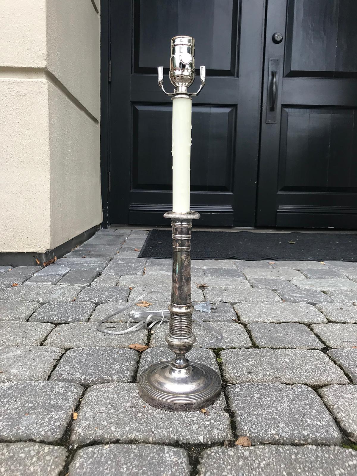 19th-20th century silver candlestick as lamp
New wiring.