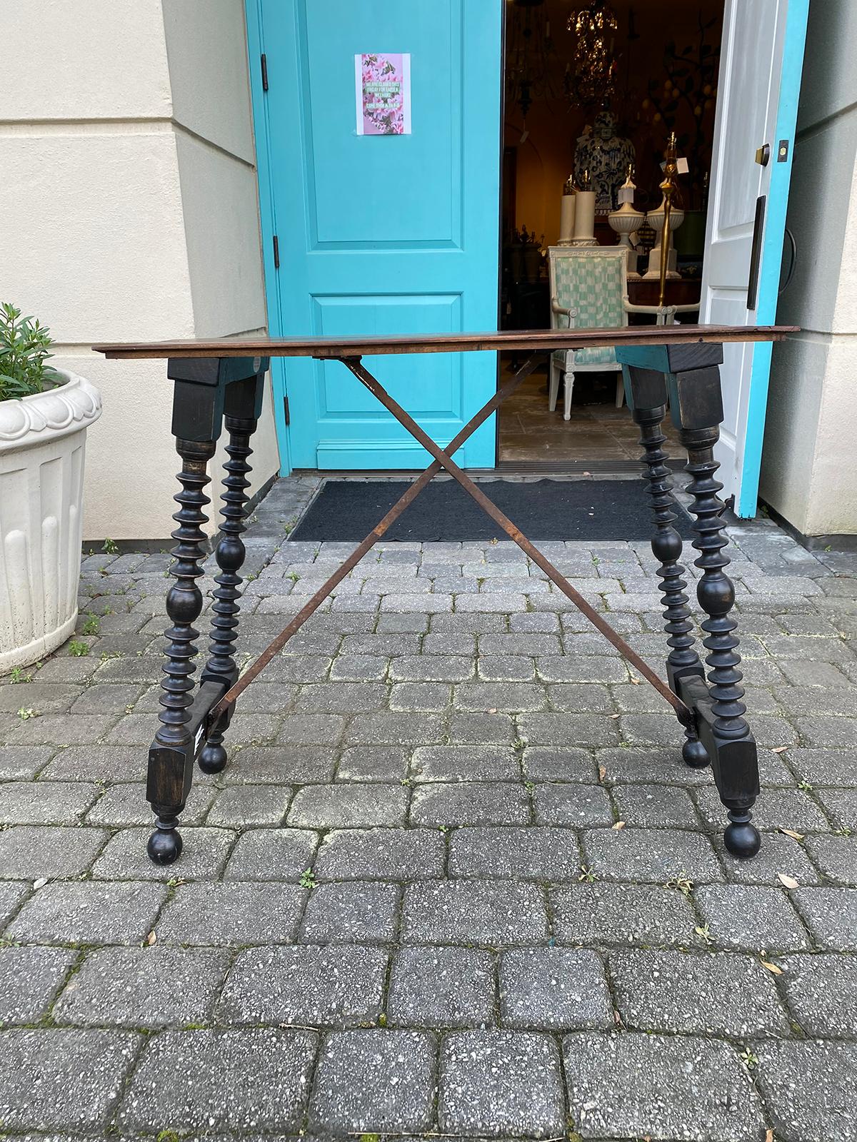 19th-20th Century Spanish side table with iron stretcher.