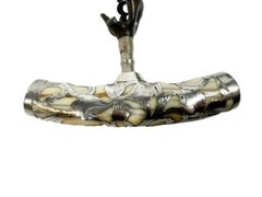 Sacacorchos con mango de marfil tallado en rama de plata de ley de los siglos XIX y XX