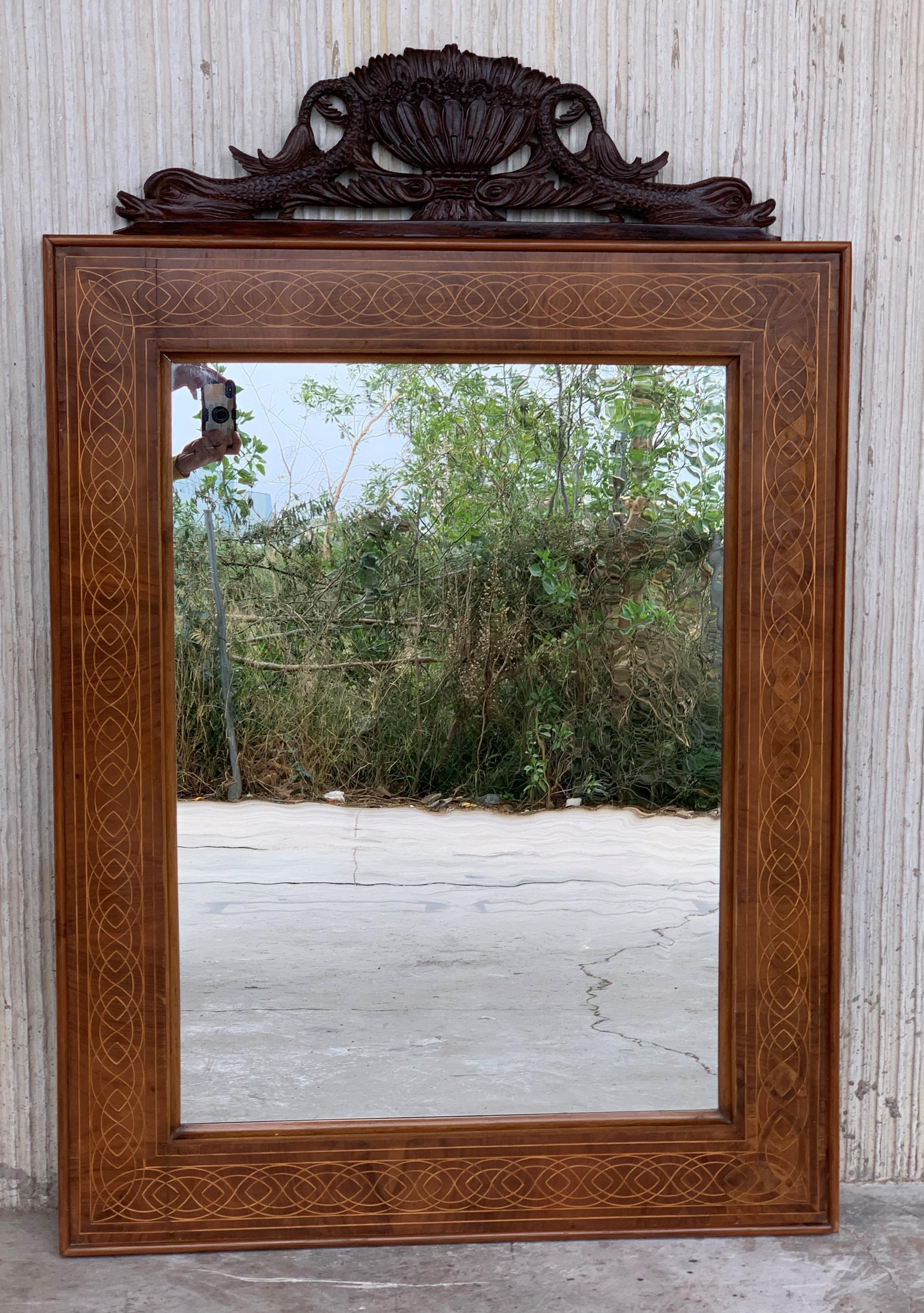 Spanish Antique Geometrical Marquetry Inlaid Mahogany Mirror with Carved Crest For Sale