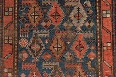 19th Century Caucasian Karabagh Rug with Geometric Medallions and Tribal Border