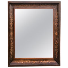 Miroir ancien en acajou marqueté du XIXe siècle