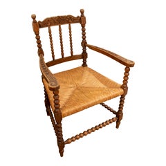 19th Antique Spanish Armchair of Carved Wood with Rush Seat