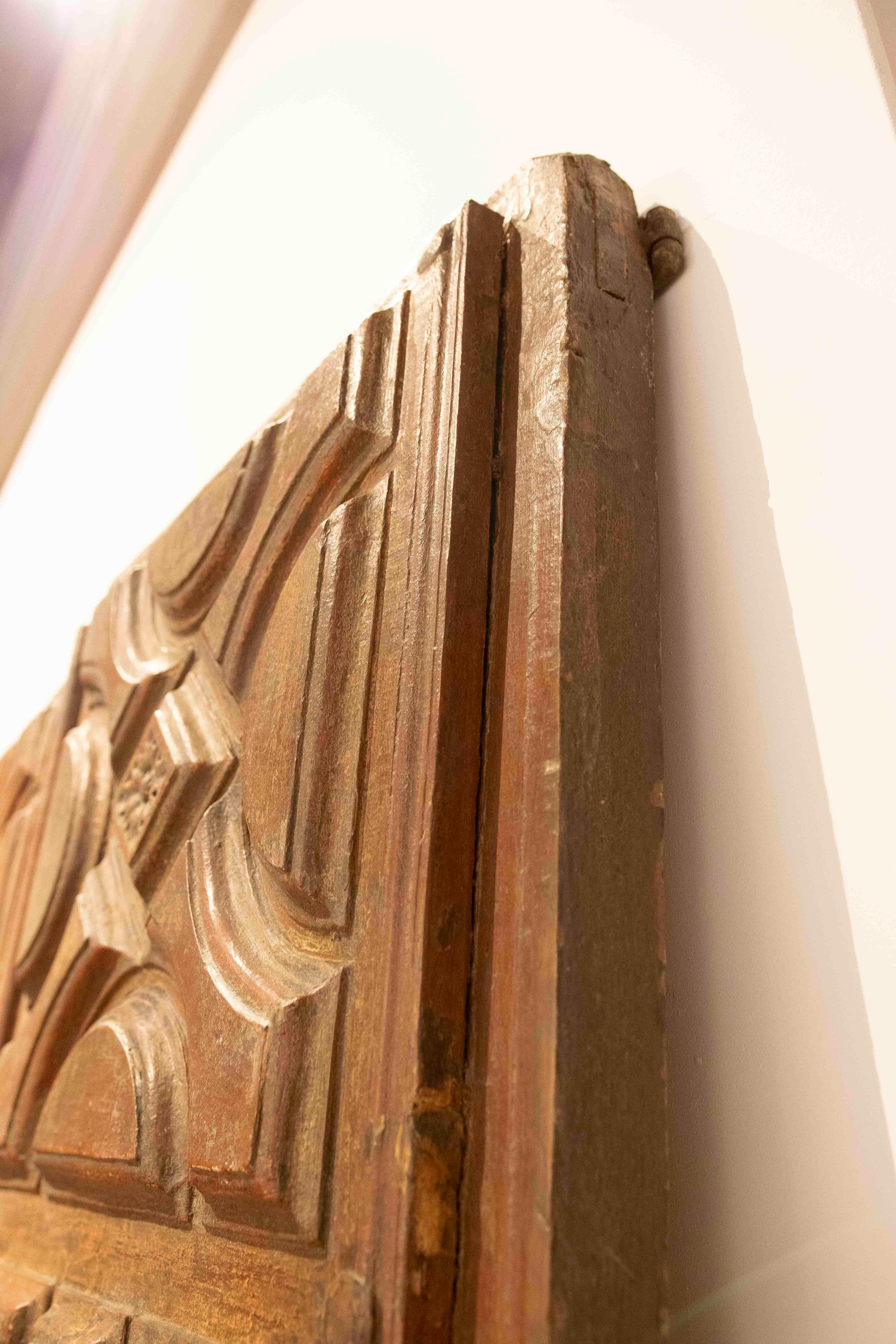 18th Antique Wooden Door Carved with Floral Motifs and Curvilinear Geometry For Sale 9