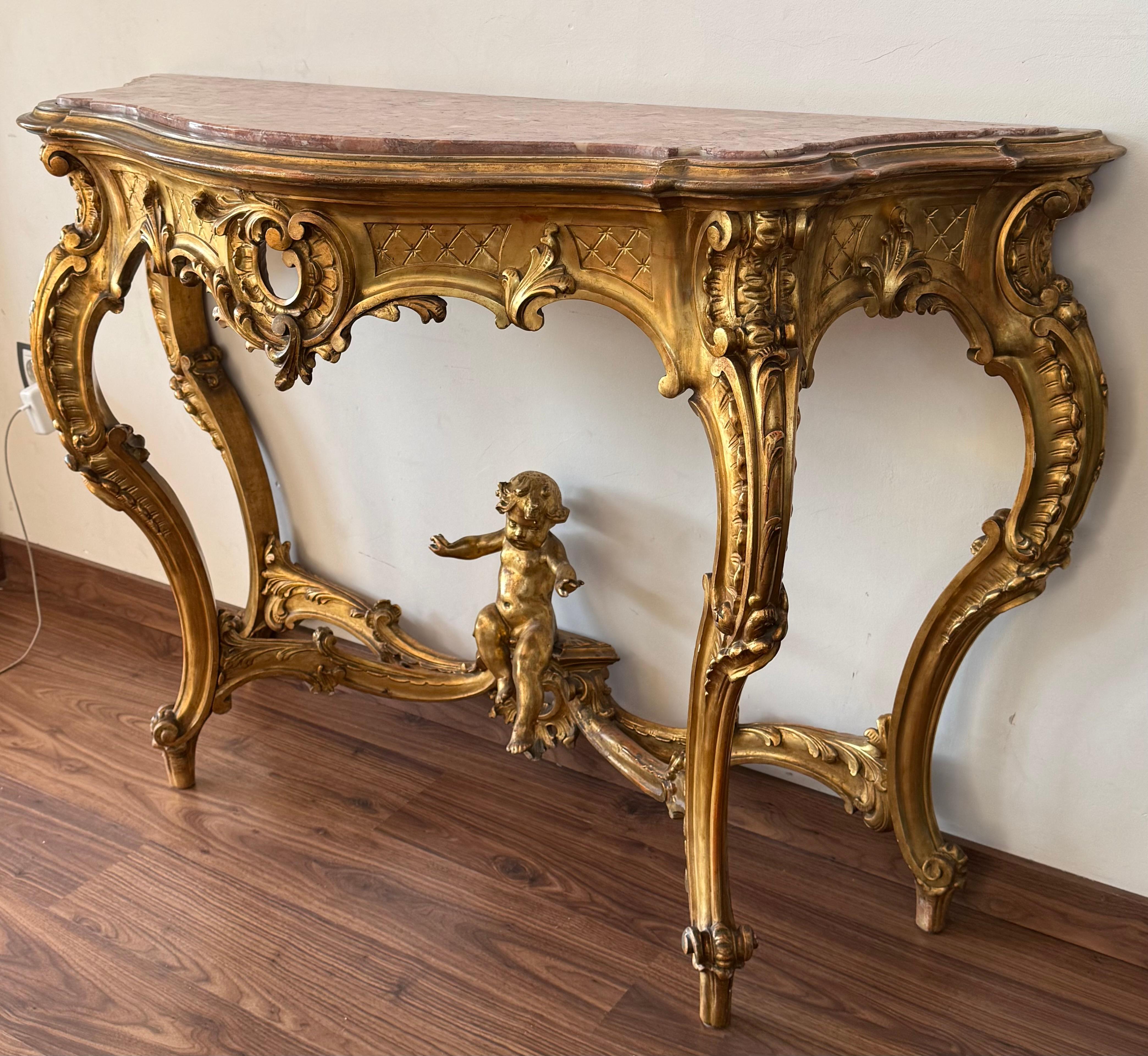 20th Century 19th Baroque Carved & Gilted Walnut Ormolu with Marble Console Table and Cherub For Sale
