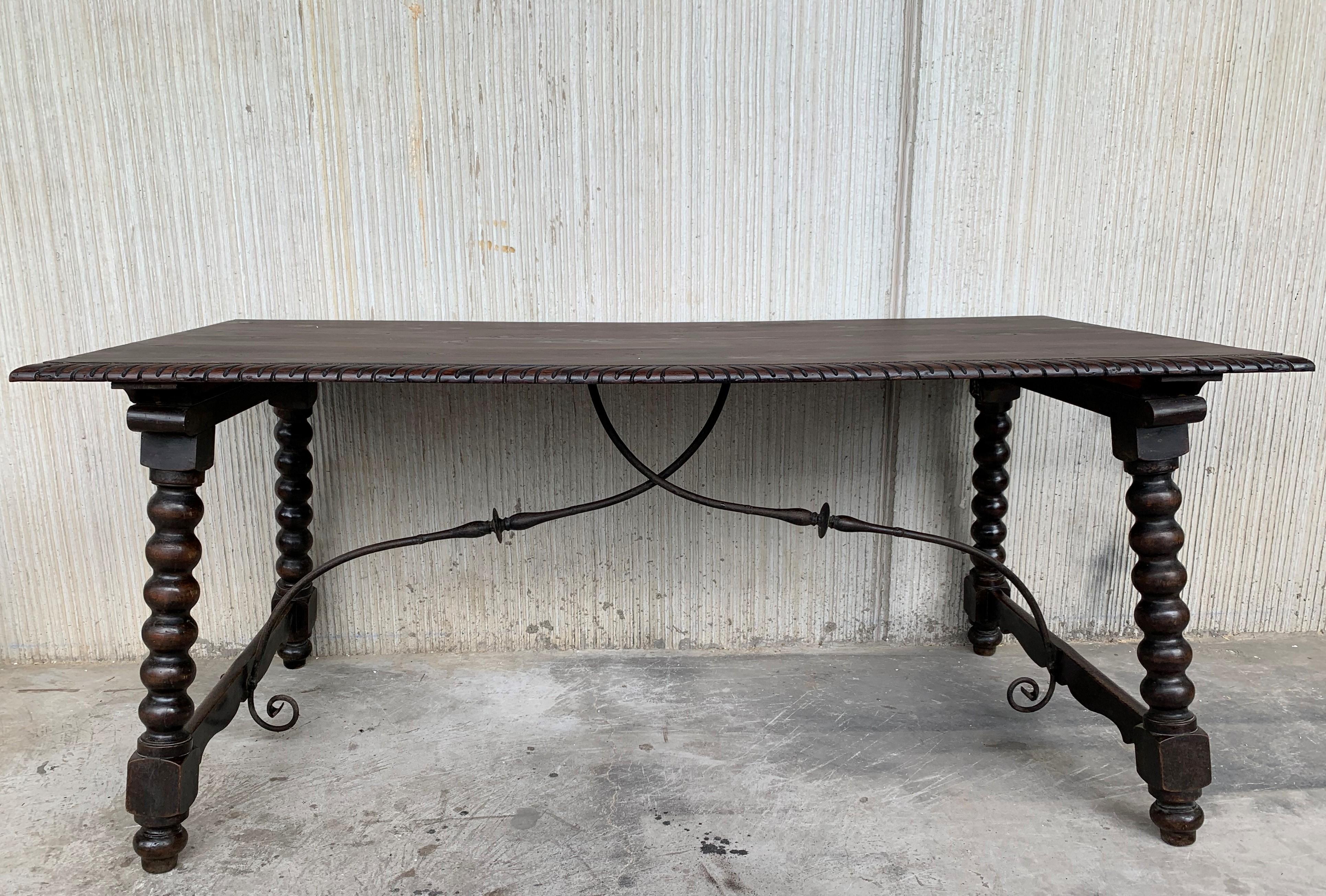 Carved 19th Baroque Spanish Farm Trestle Lyre Leg Dining Room Table with Forged Iron