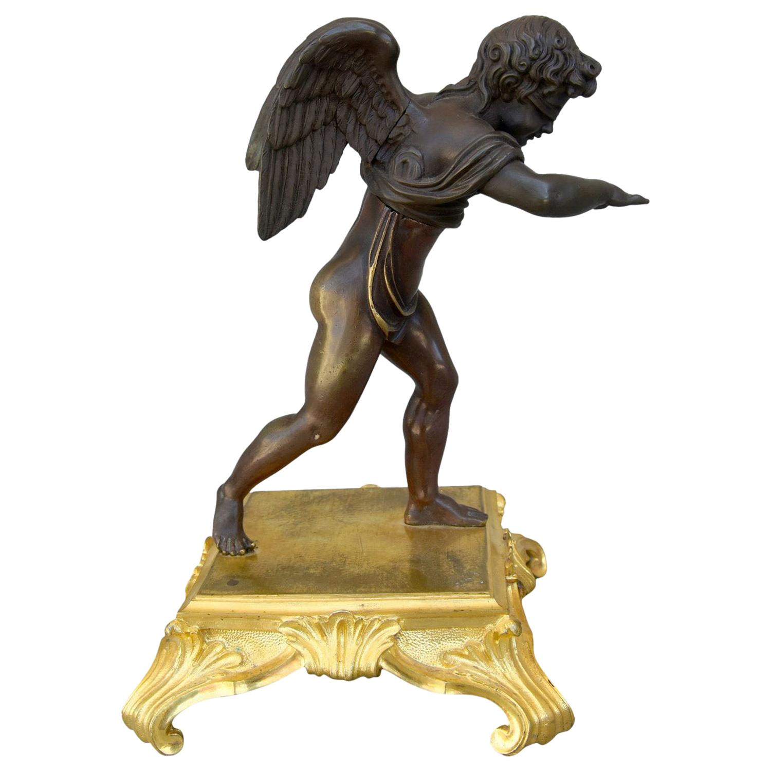 "Amour aveugle" Statuette en bronze patiné de Cupidon cherchant l'amour les yeux bandés en vente