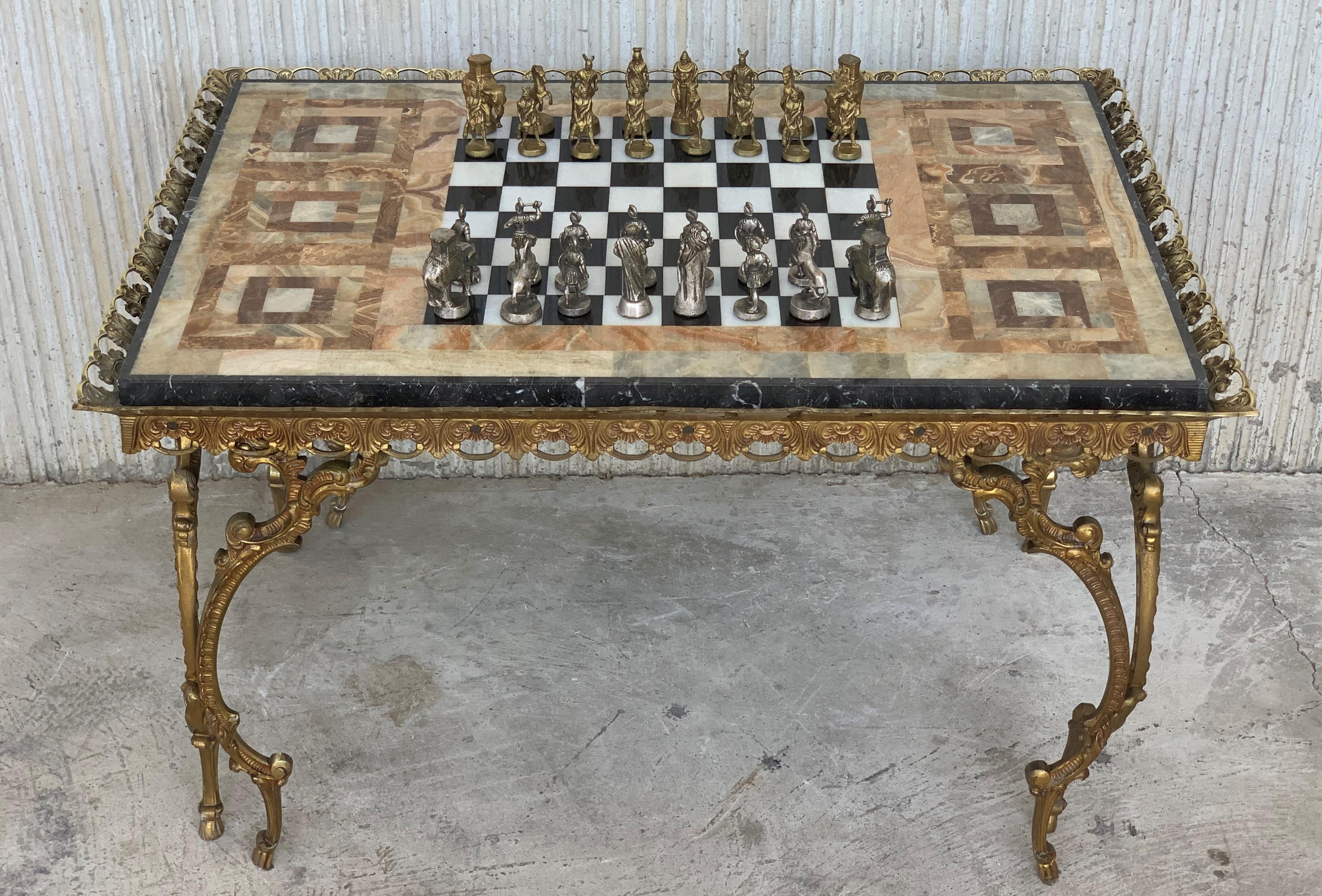 19th century bronze game of chess with marble and bronze table
Top marble in perfect shape with beautiful bronze edges and legs.