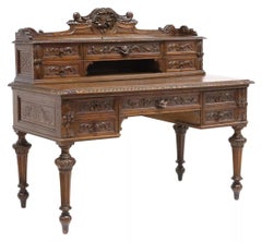 Bureau ancien du 19ème siècle, style Henri II français, sculpté en chêne, années 1800