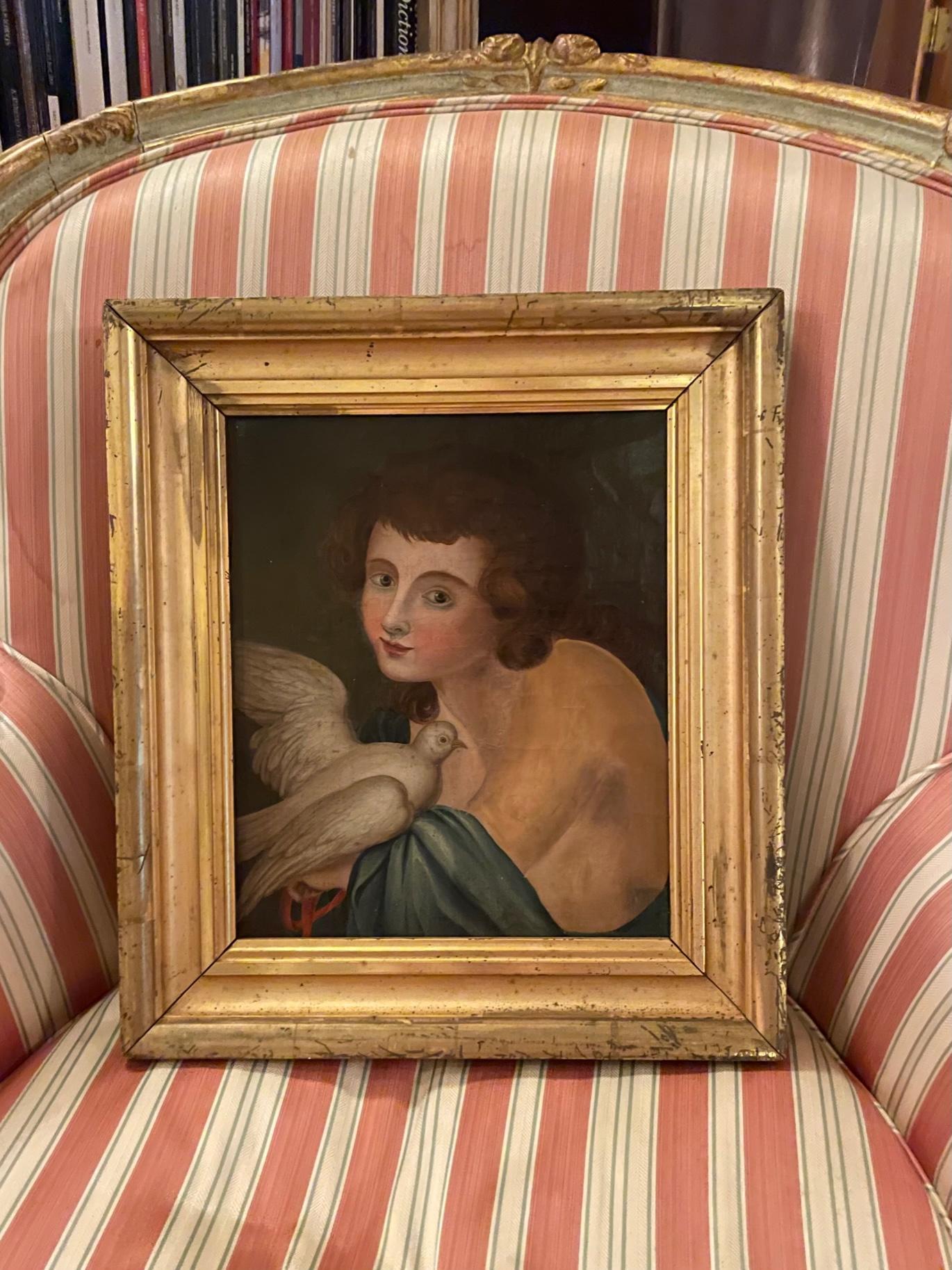 19th century American folk art portrait painting in original period lemon gilt frame.

Beautiful and charming portrait painting in oil on canvas of a little girl holding a dove to her chest. Although painted with great artistry, it maintains the