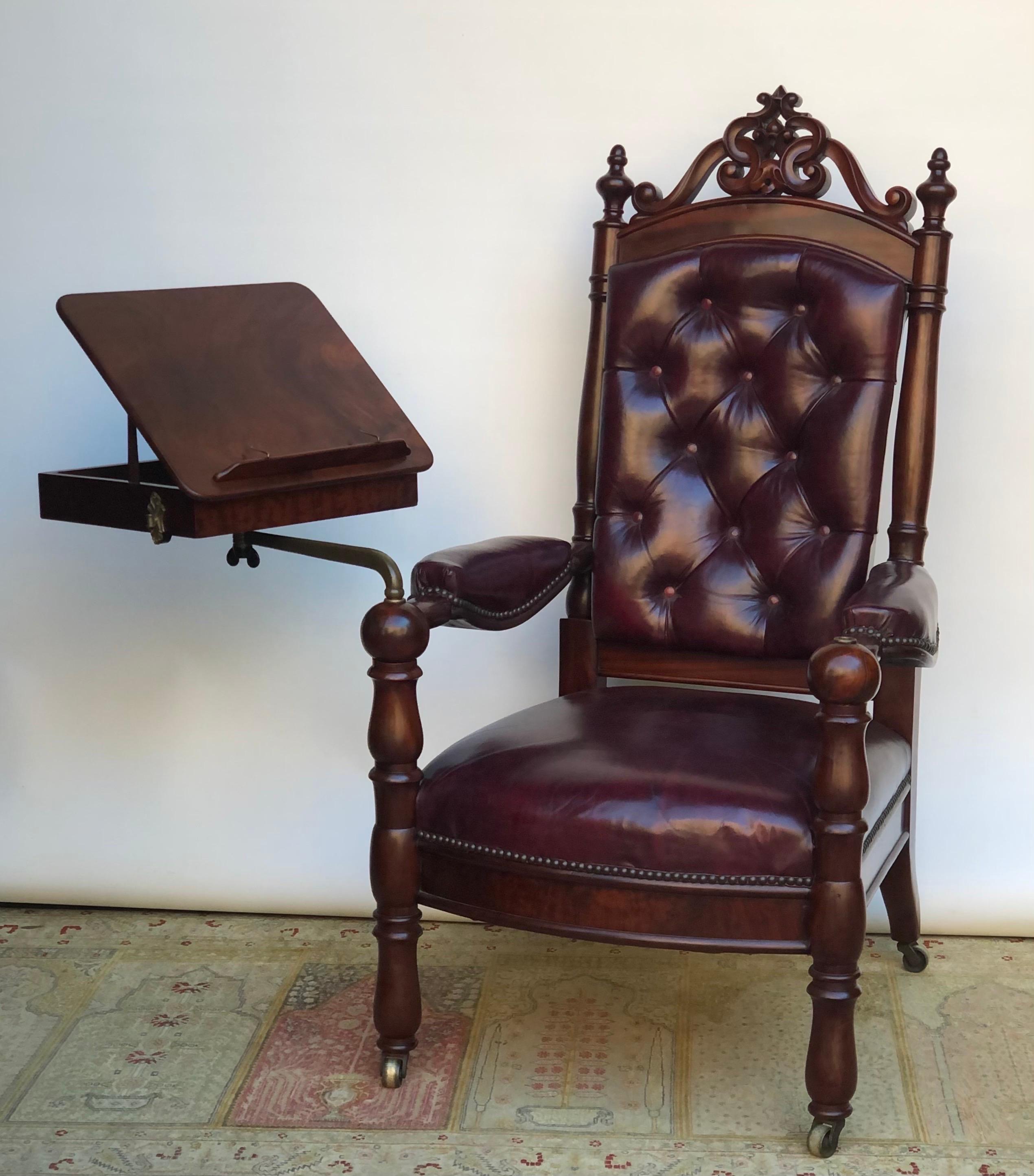 This Regal Mahogany leather reading / library arm chair can be used with or without the reading stand and was made in America in the early 19th century. The American Reading Arm Chair has a solid mahogany frame with an adjustable reading stand that