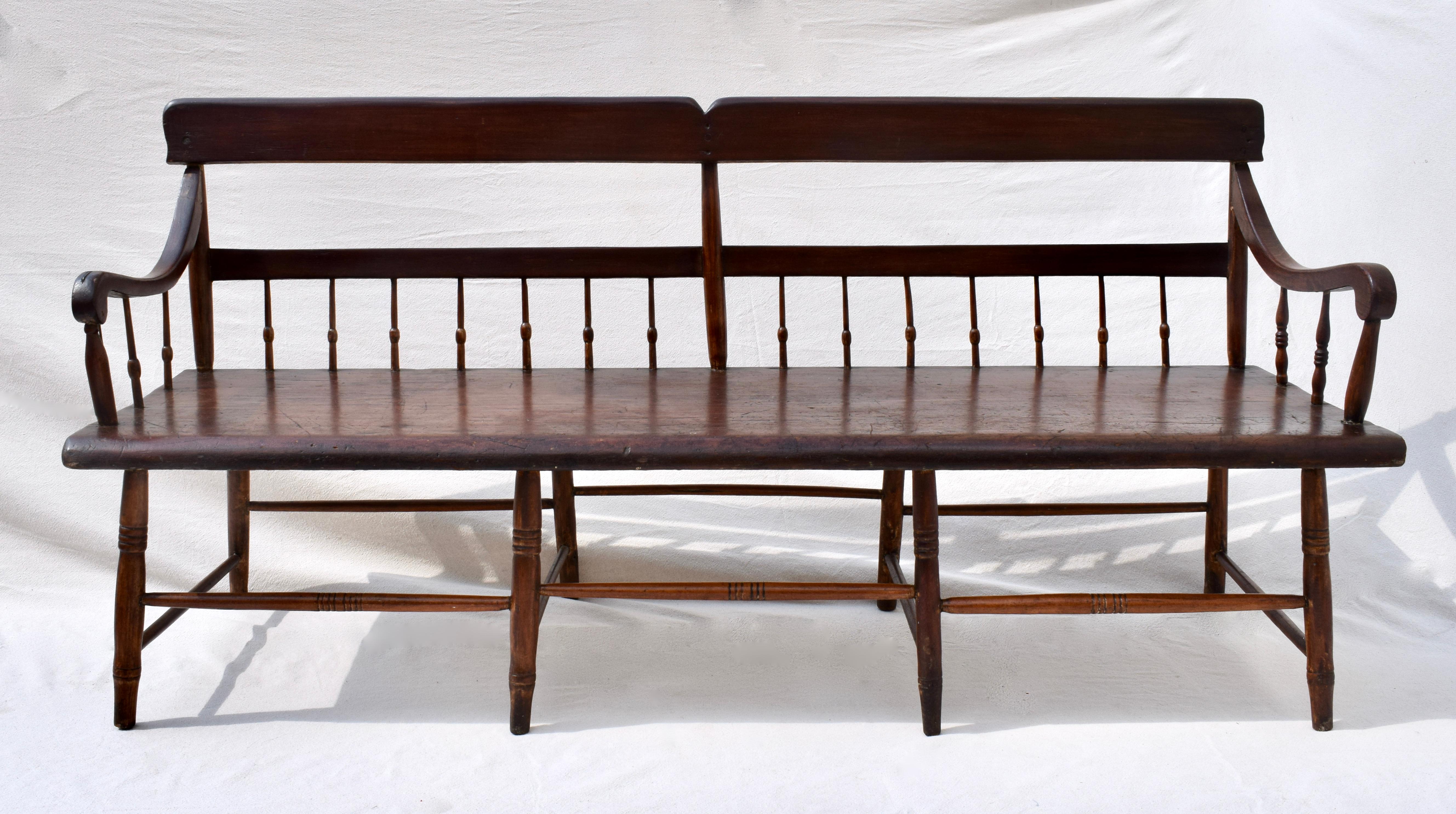 19th C. Pennsylvania pine & poplar Windsor bench with half spindles & plank seat, enhanced with a single custom cushion in new vintage stock hand loomed flame stitch upholstery.