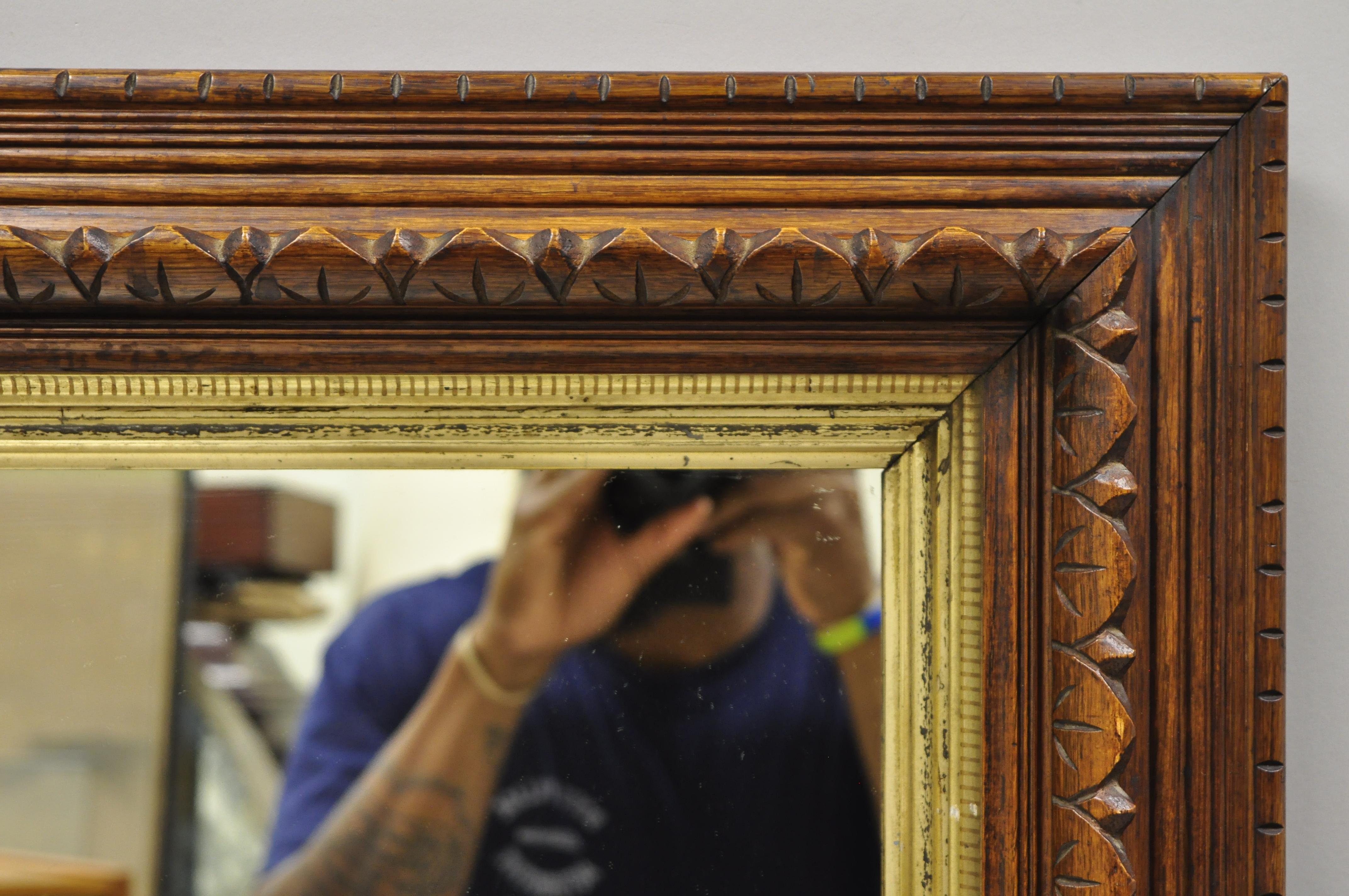 19th century American Victorian hand carved oakwood gold gilt shadow box mirror. Item features solid hand carved oakwood frame, original gold giltwood inner frame, beautiful wood grain, very nice antique, quality American craftsmanship, circa 19th