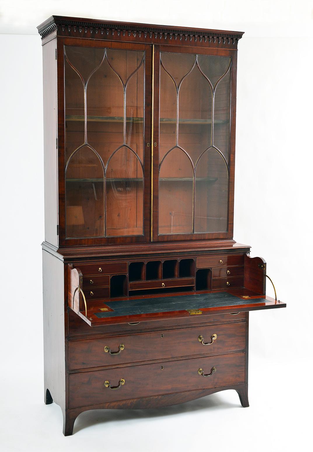 A good quality Regency mahogany secretaire bookcase of large proportions, circa 1820. Sourced from a Dorset country house sale, the previous owner obtained it from John Keil Antiques in Kensington in the 1970s.
The dentil cornice above a pendant