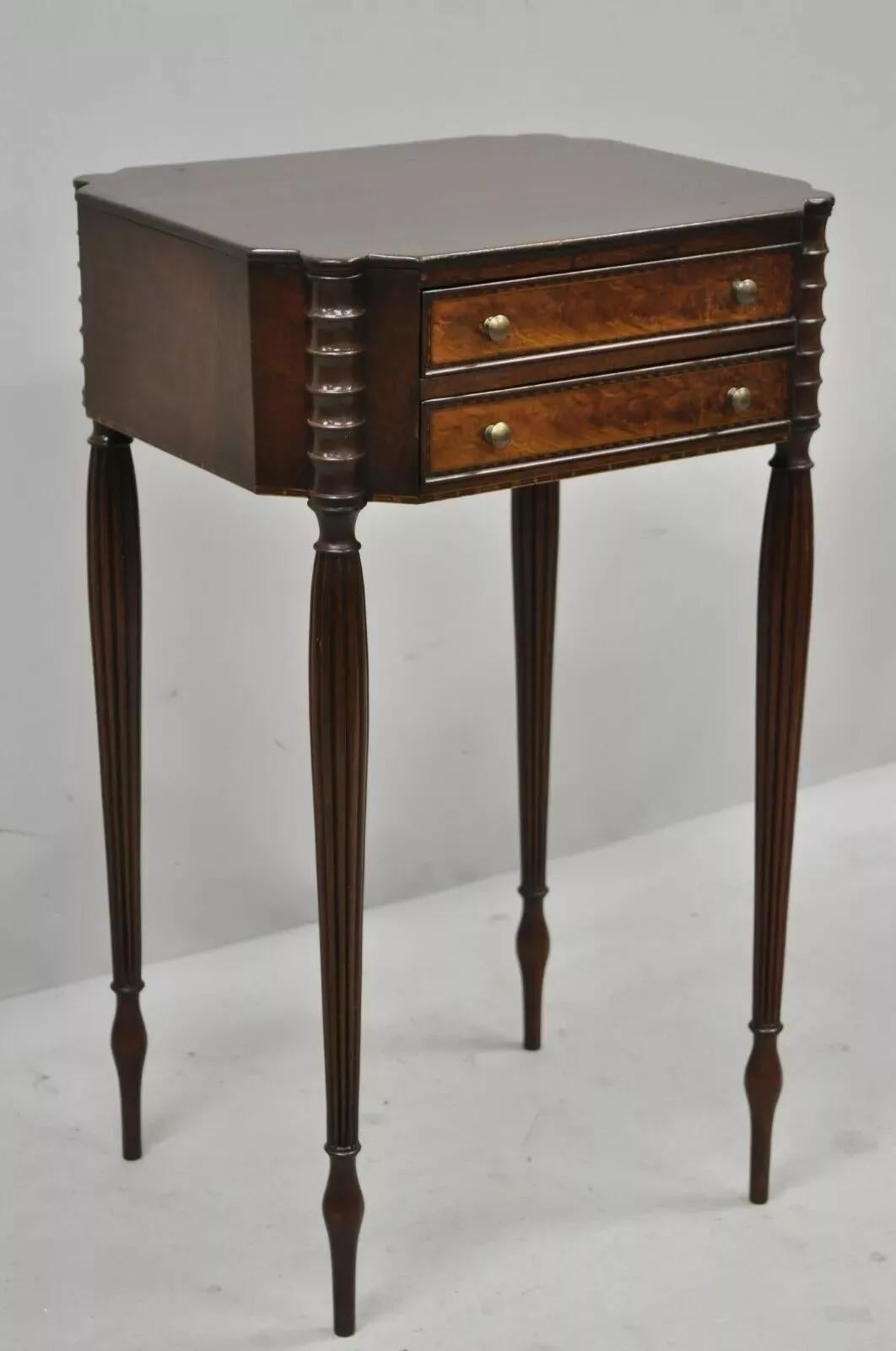 19th C. Antique Sheraton Tapered Leg Burl Wood 2 Drawer Nightstand Side Table. Item features beautiful wood grain, nicely carved details, 2 dovetailed drawers, tall tapered legs, fine inlay, very nice antique item. Circa Late 19th Century.