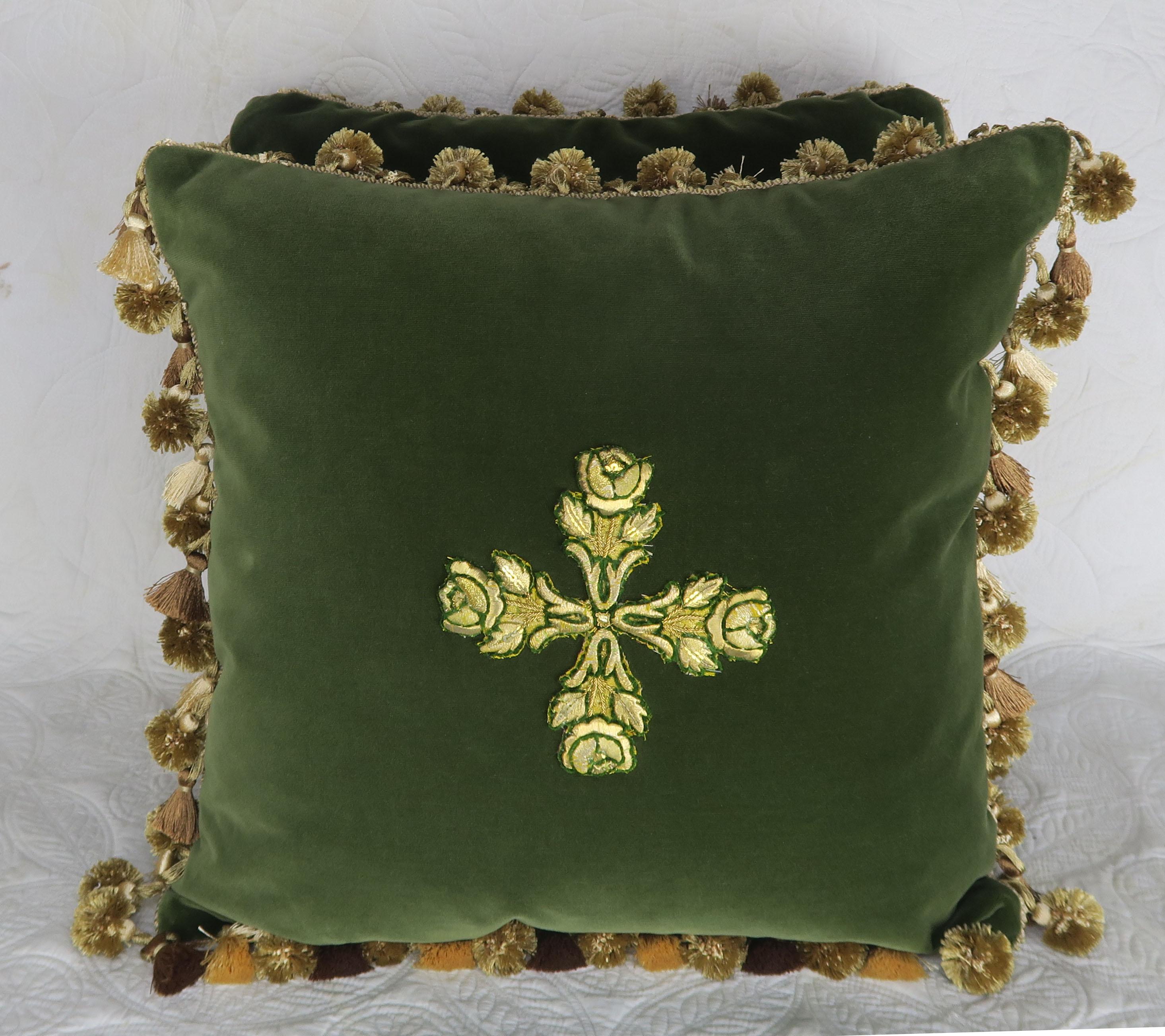 Pair of custom pillows made with 19th century gold metallic appliques sewn on contemporary emerald green velvet front with a lighter green silk back. Multicolored green and gold tassel fringe around the perimeter of pillows. Down inserts, sewn