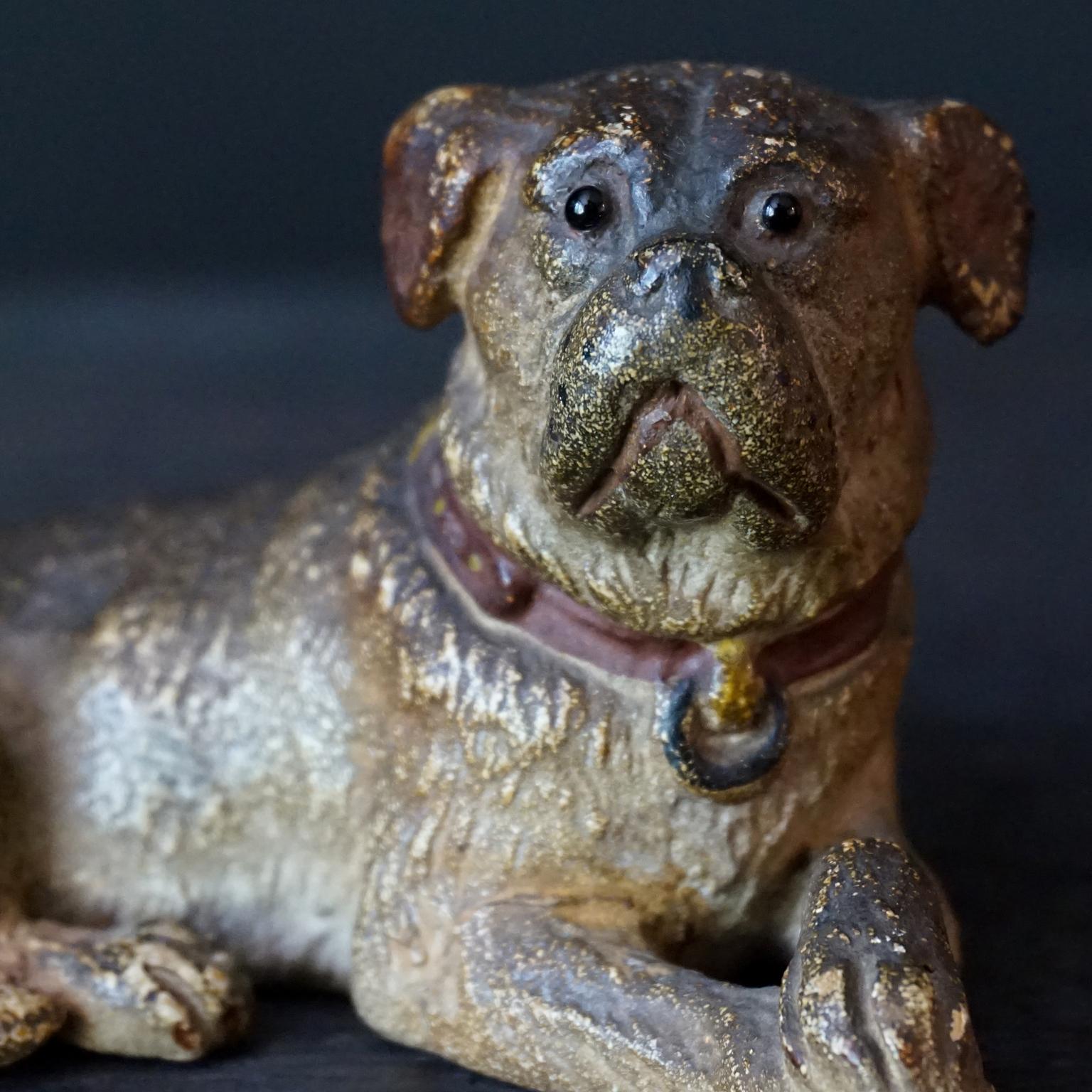 19th C. Austrian Cold Painted Terracotta Lying Pug Dog Red Collar Glass Eyes In Good Condition For Sale In Haarlem, NL
