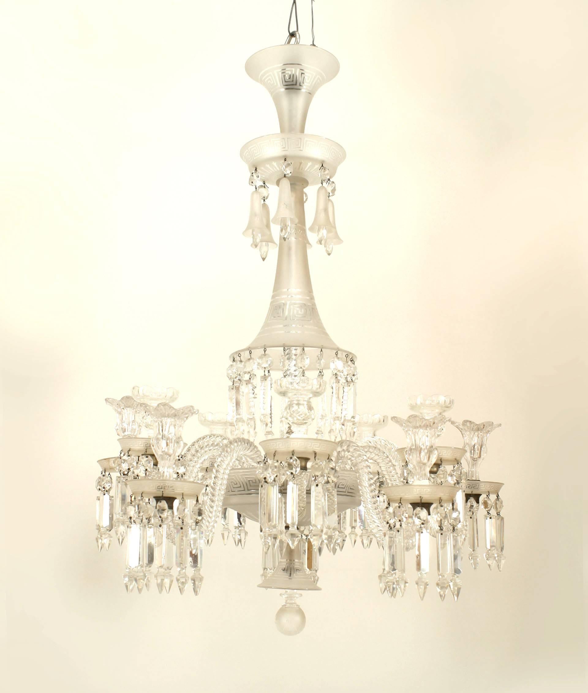 French (19th Century) frosted & clear Baccarat crystal chandelier with two-tiered ten upswept swirl arms having etched Greek key motif bobeche & crystal drops and a finial ball bottom.
