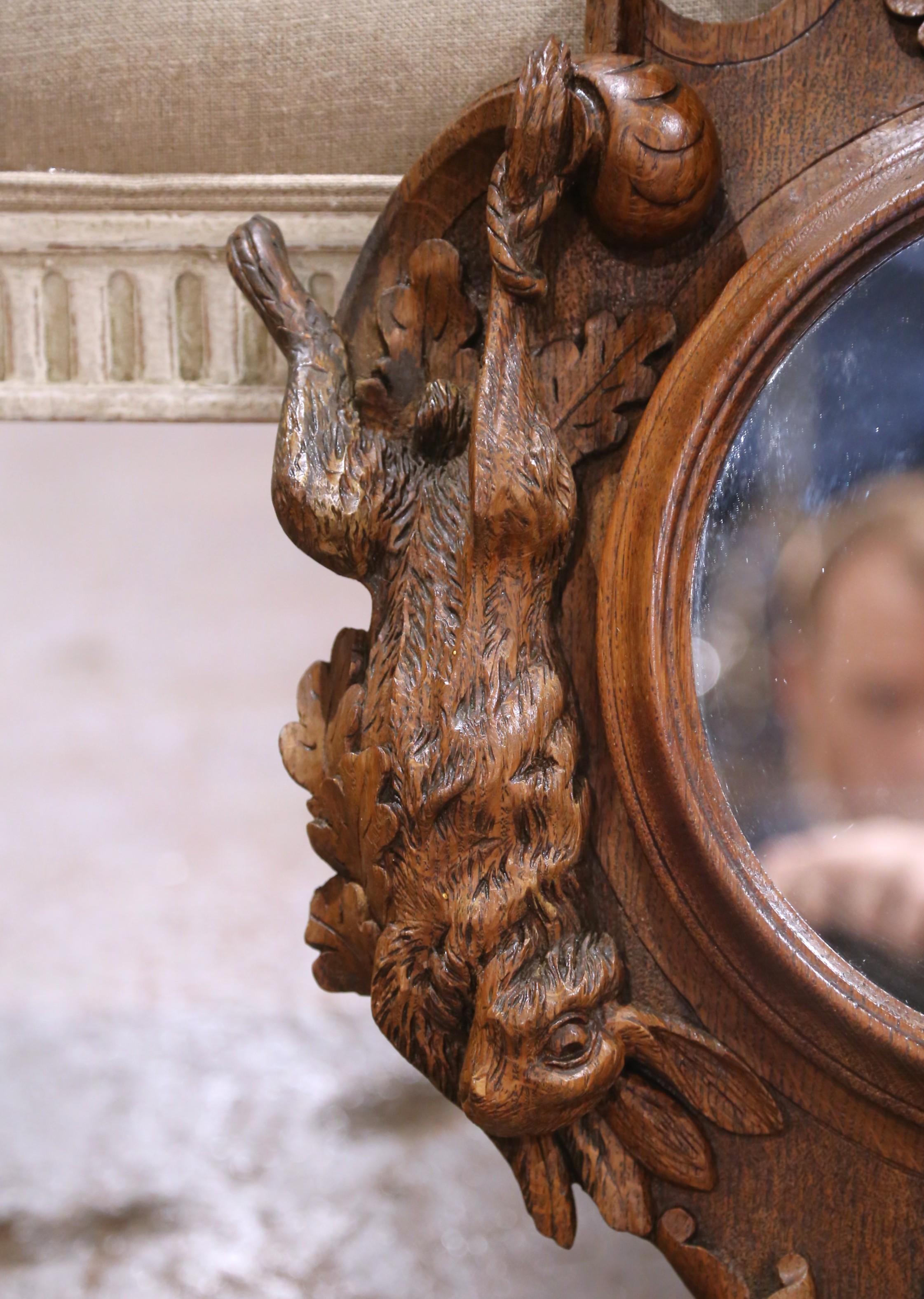 19th Century 19th C. Black Forest Carved Walnut Hunt Mirror with Dog, Game, and Grapes For Sale