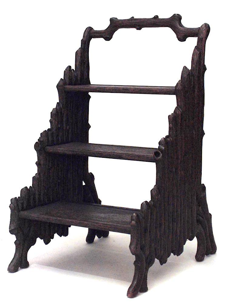 Rustic Black Forest (19th Cent) walnut 3 step library ladder with carved branch design. (late 19th cent.)
