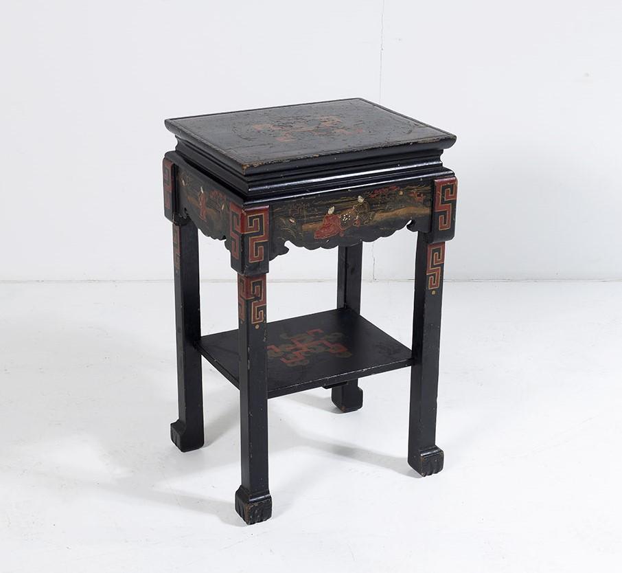 Superb character, 19th century oriental side table of Chinese origin. Black lacquered finish with decorative gilt detailing intertwined with Greek Key pattern in a wonderful deep red colour, the tone of which seems unmatched and is a key feature of