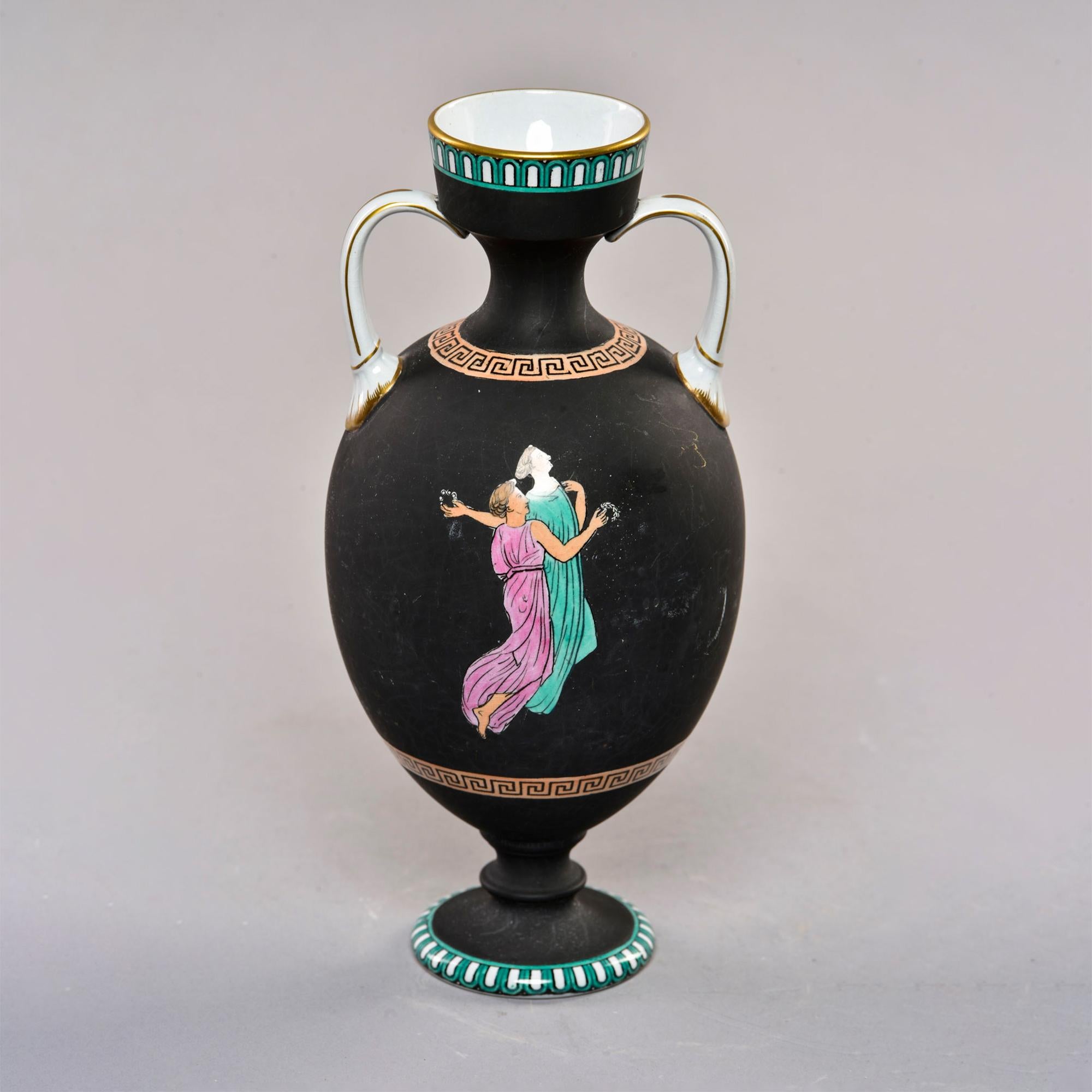 Circa 1890s black porcelain neoclassical vase found in England in amphora form with hole in base - probably intended to be a lamp. Colors still vibrant and true - white blur on figures seen in some detail photos is the reflection of our photo lights