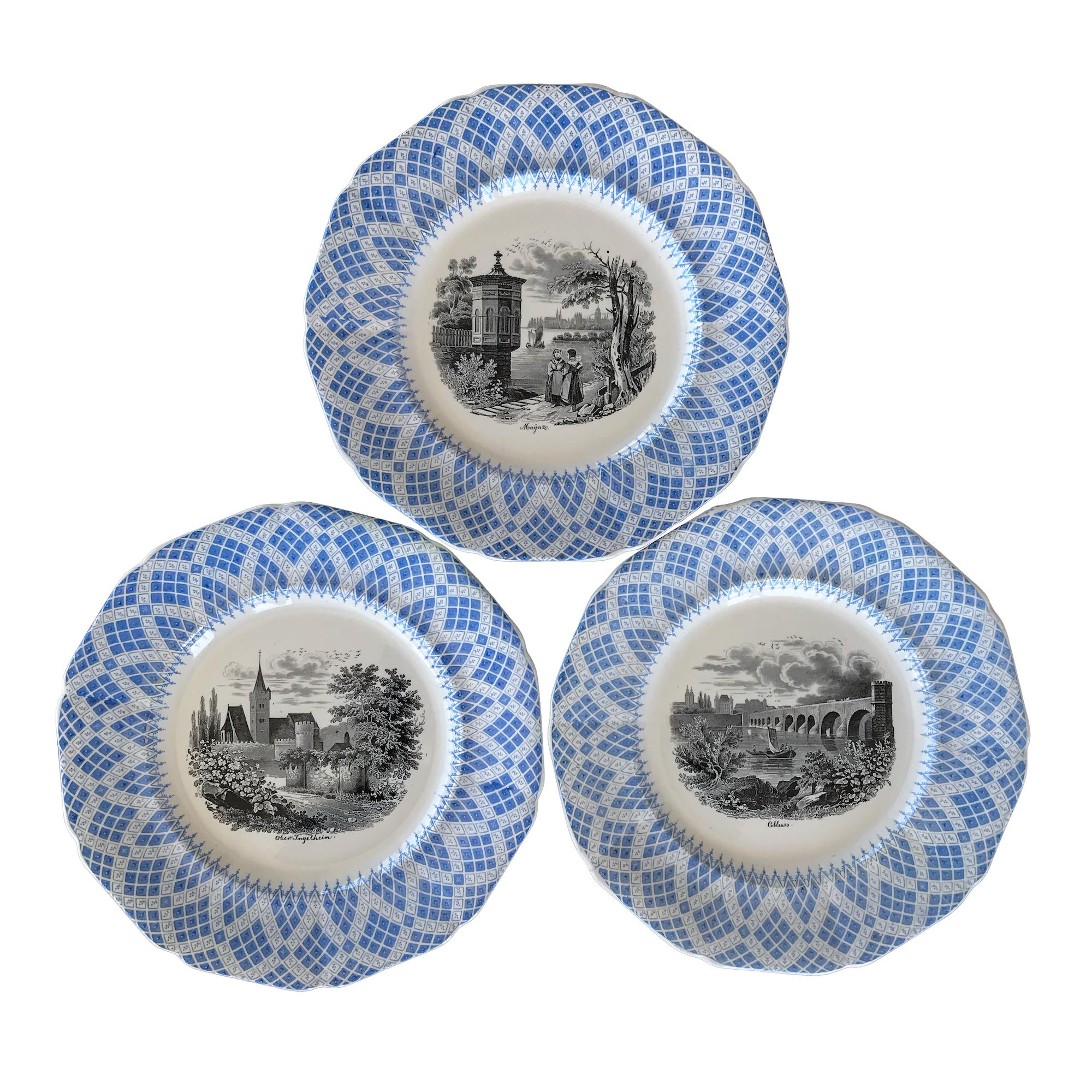 A collection of six unusual dessert plates with a wonderful cornflower blue decoration which contrasts beautifully with the central scenes in black with view of German cities.

The cities depicted are:
-Andernach
-Koblenz
-Cologne
-Mainz
-Ober