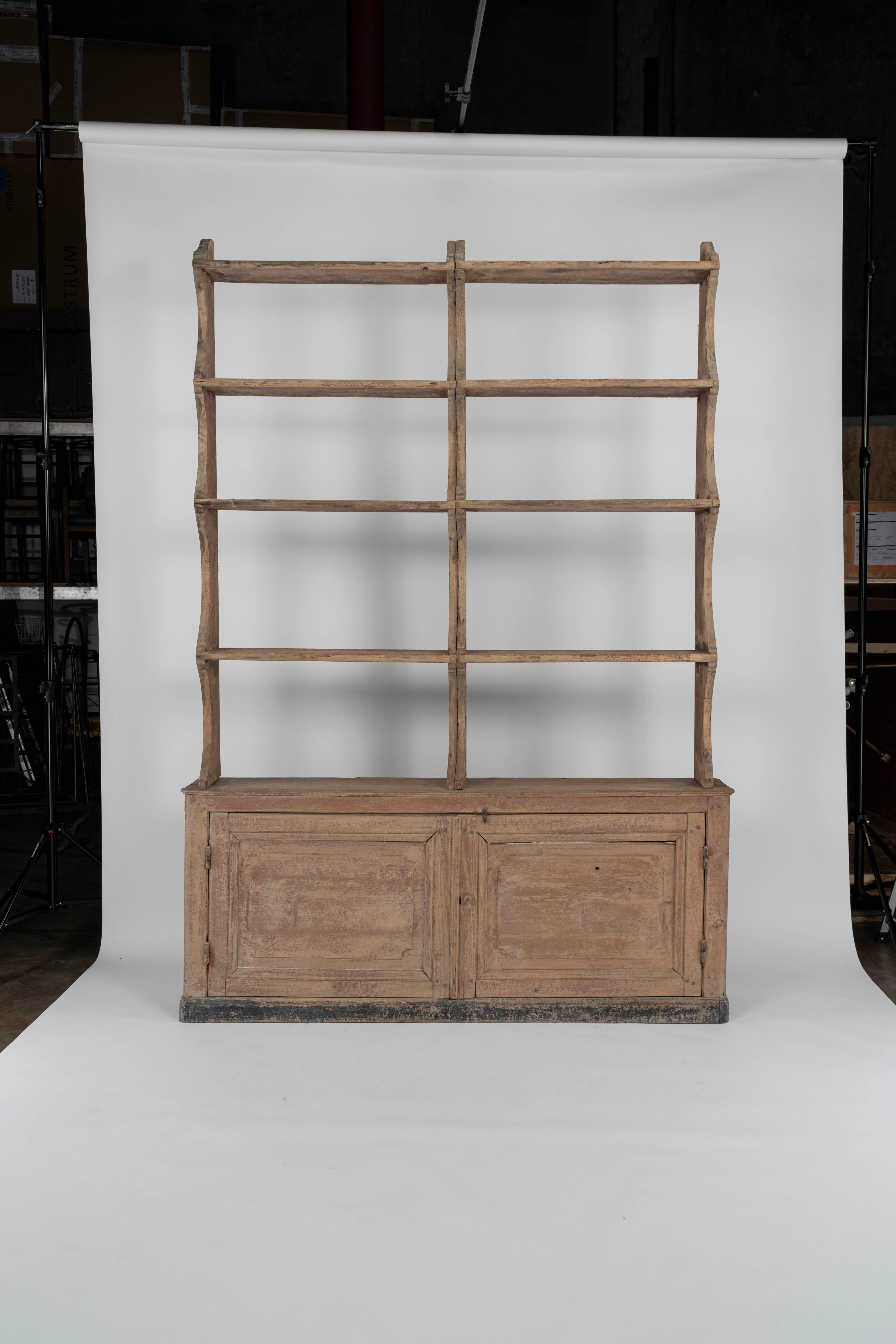 Rustic and interesting piece with large top set of shelves.  Once shipped, shelving should be attached to bottom piece and/or secured to the wall.

Bottom Piece measures;  W:  67.75  D: 13.5