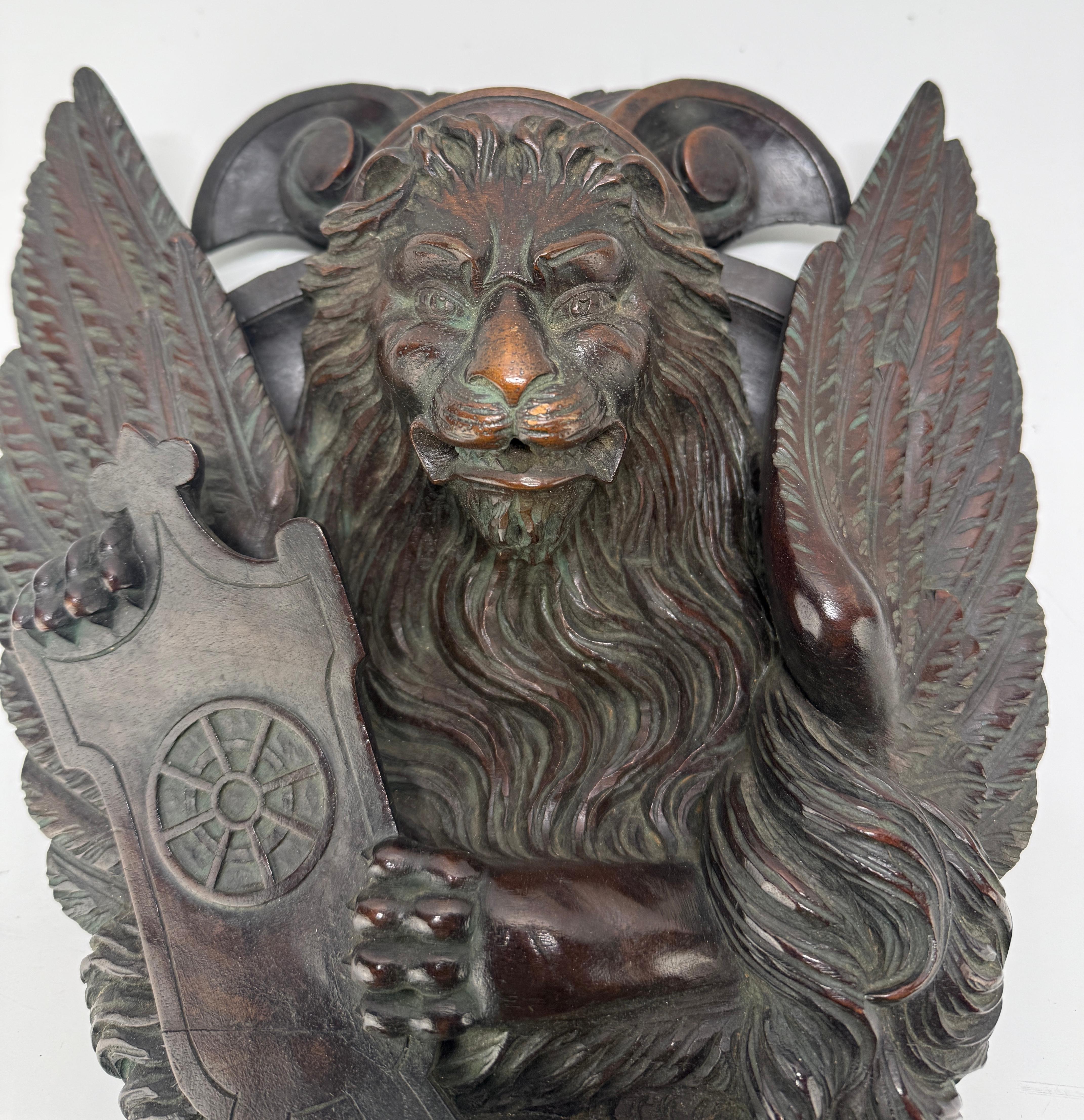 Wood 19th C Carved Mahogany Relief of the Lion of Saint Mark Wheel of Saint Catherine For Sale
