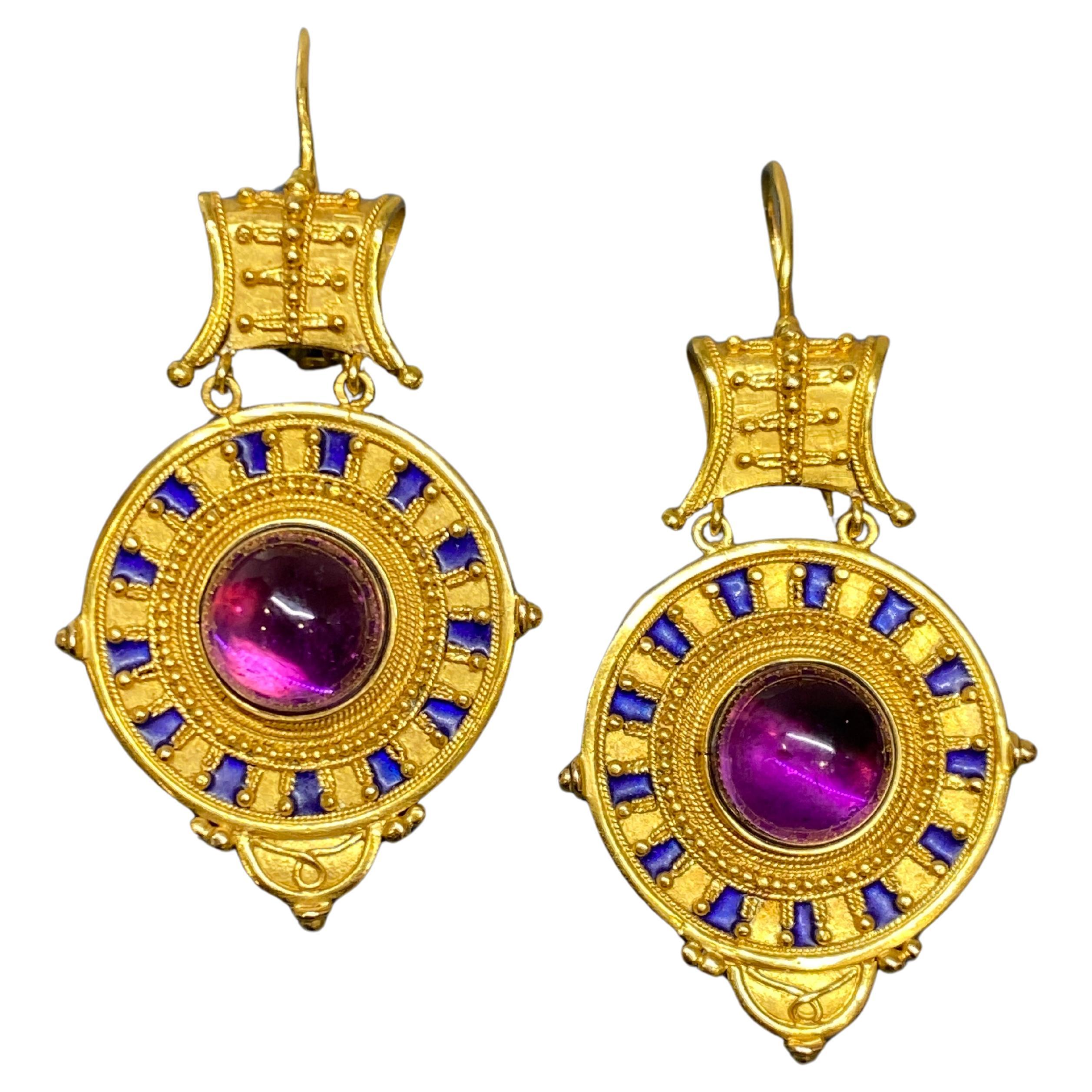 Superb pair of late 19th century etruscan, archaeological revival earrings, artfully crafted by Castellani, one of the leading jewellery masters during the Victorian period.

These magnificent earrings feature a medallion circlet with a high done