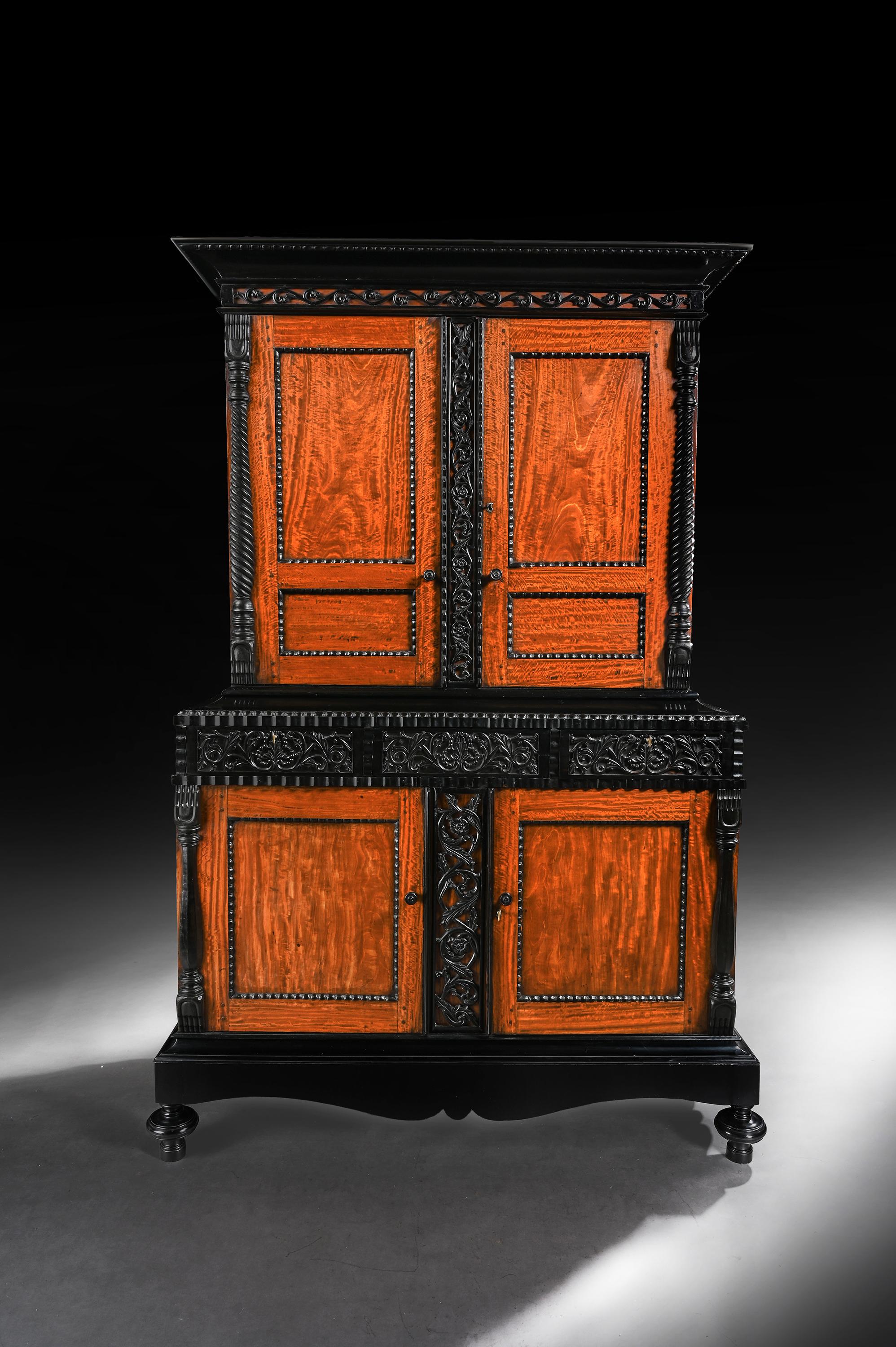 A fabulous exhibition quality 19th century Ceylonese Indo-Dutch solid satinwood and ebony cabinet.

Ceylon (Sri Lanka), circa 1830.

A stunning and rare Dutch Colonial satinwood cabinet / armoire with ebony carved detail.

The solid ebony