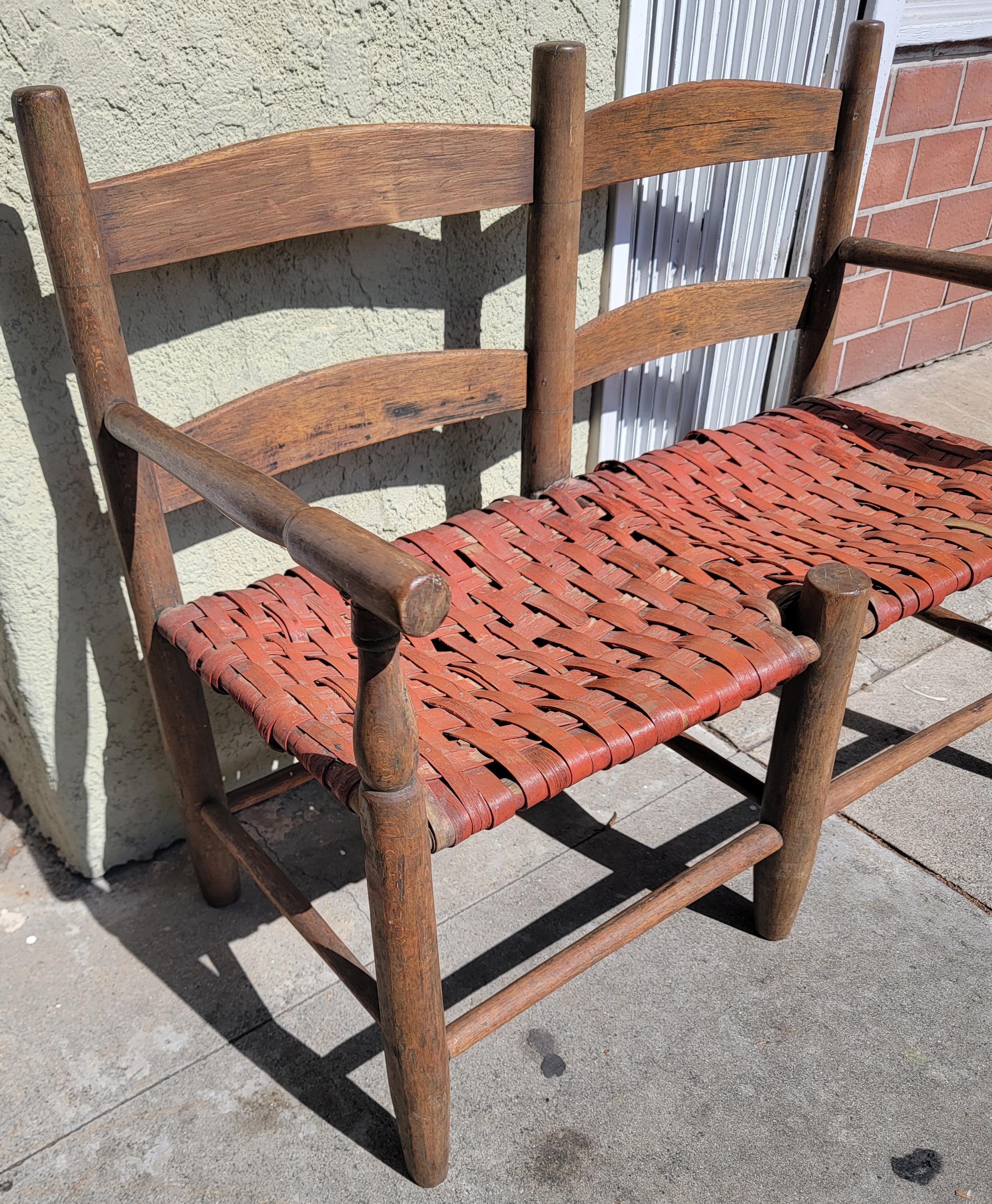 Fantastic 19th C child's bench with red woven splint seat.