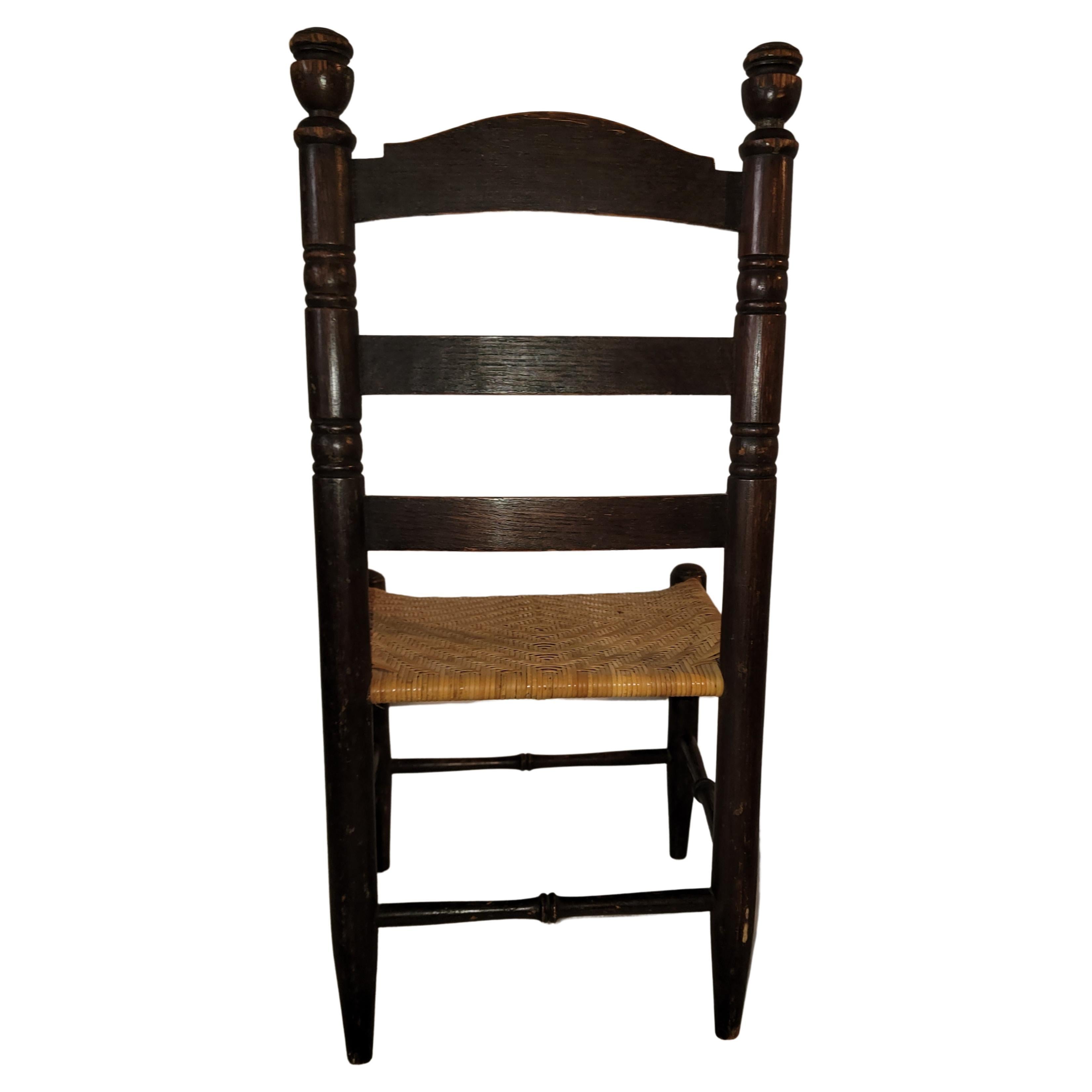 Rattan 19th C Childs Ladder Back Chair with Original Rush Seat For Sale
