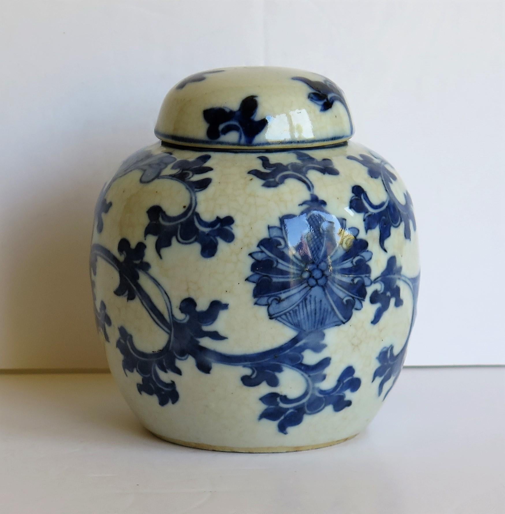 This is a very decorative Chinese Export moulded porcelain blue and white lidded jar or Ginger Jar with a hand painted floral vine scene, dating to the Qing period, early or mid-19th century.

The jar is hand potted with the porcelain moulded or