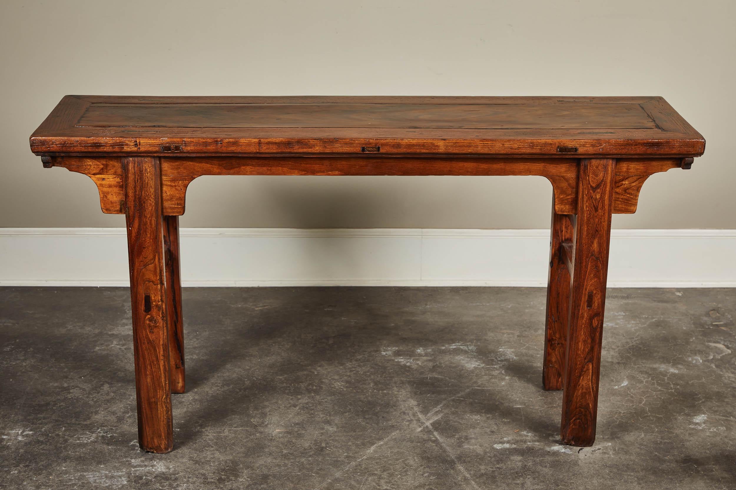 A 19th century Chinese Ming-style altar table made of elm. From Hebei.