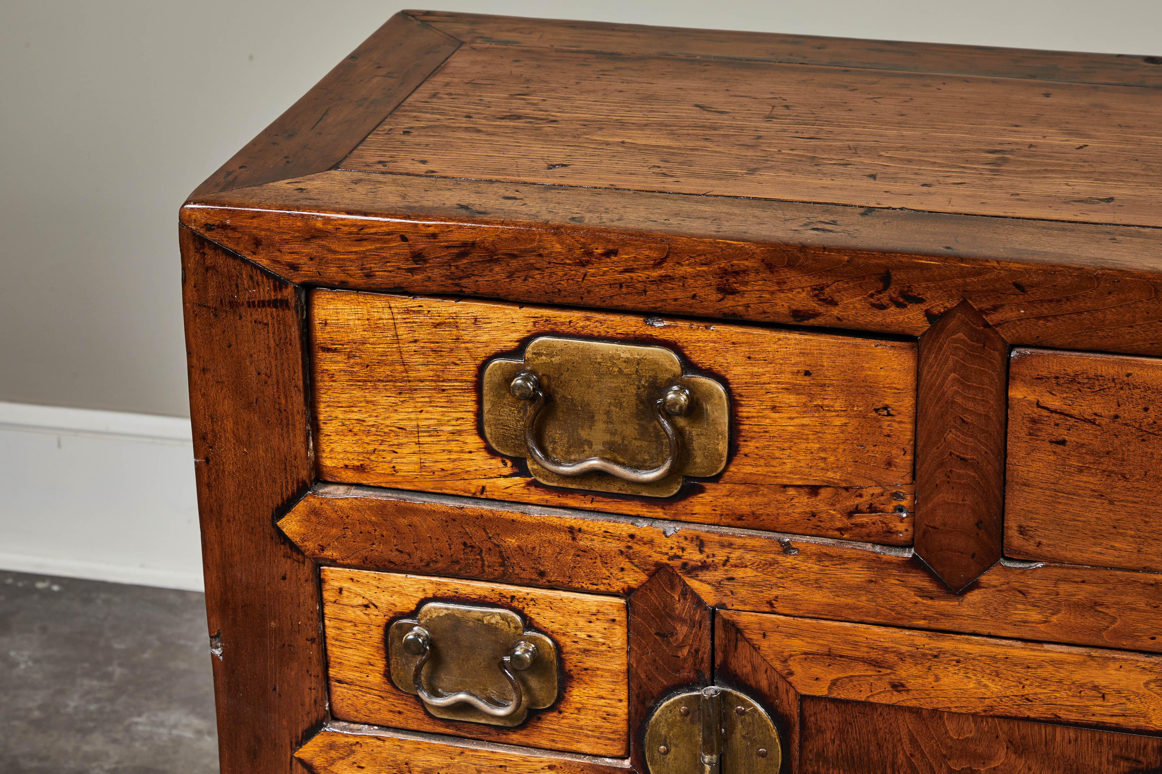 Poplar five-drawer two-door cabinet from Tianjin, circa 19th century.