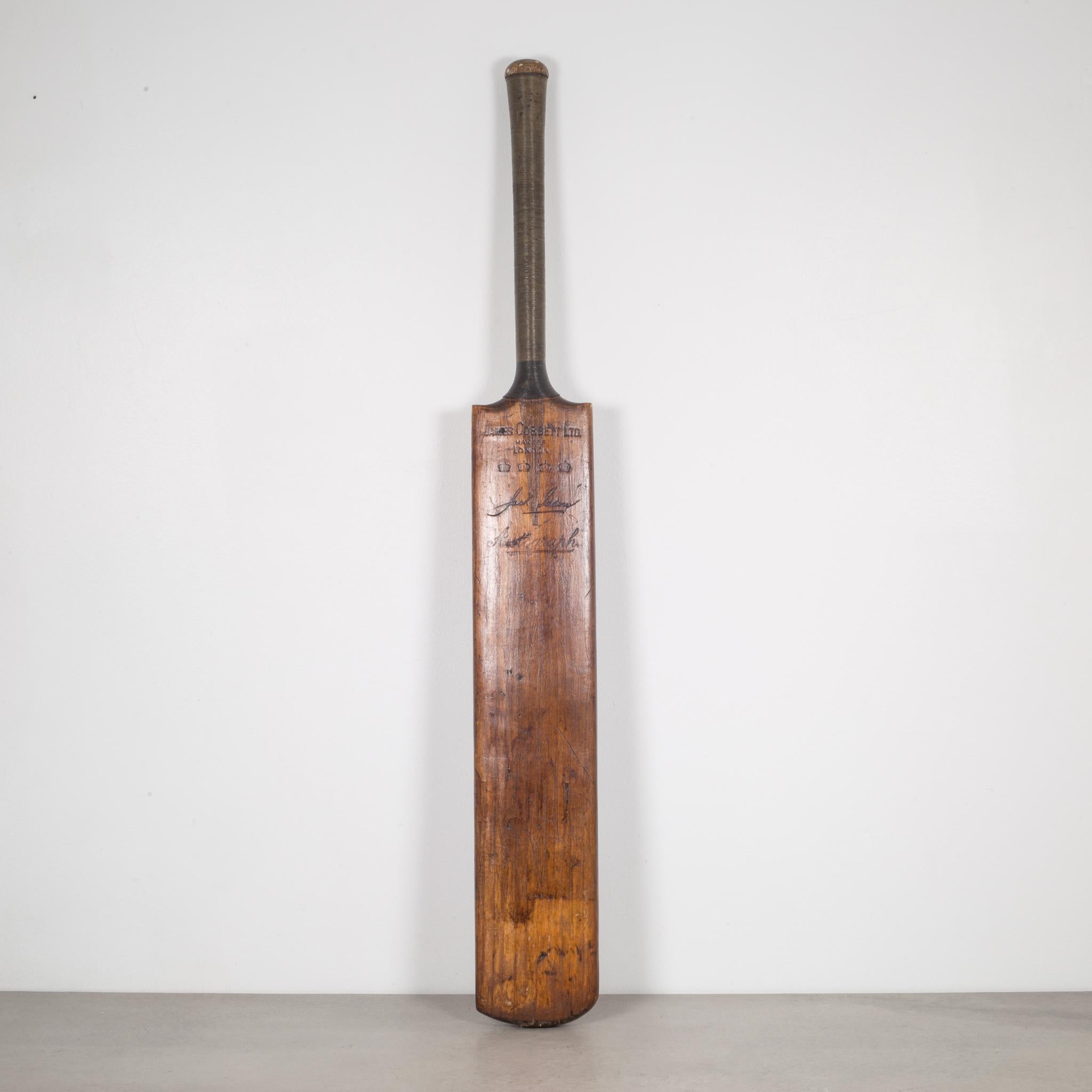 About

This is an original James Cobbett wooden cricket bat with two tone twine handle and branded with the maker's logo and several royal crowns. The bat has retained its original finish.

Creator James Cobbett Ltd. 
Date of manufacture, circa