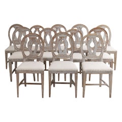 19th c. Collection of Twelve Gustavian 
Swedish Model
 Chairs in Original Paint