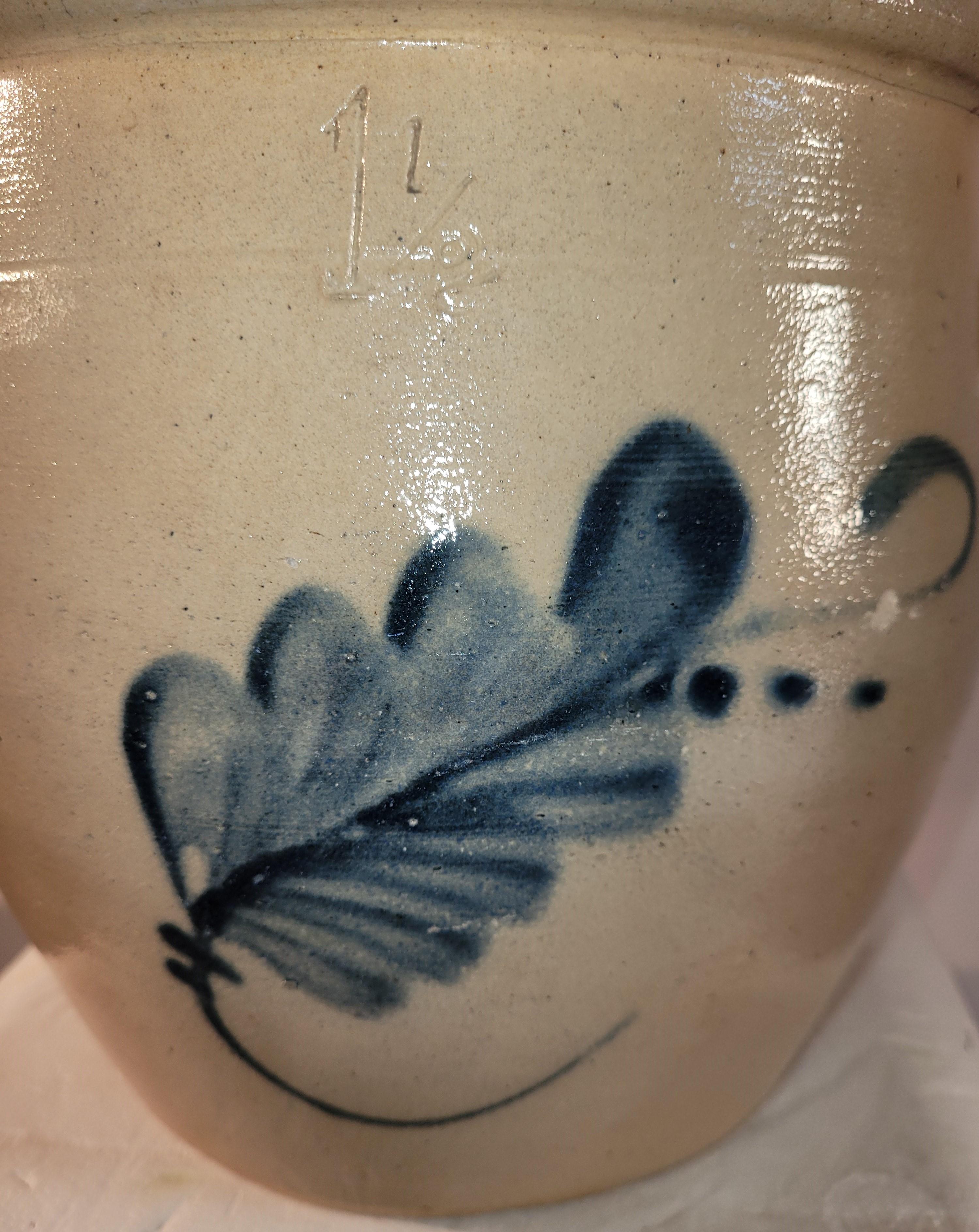 19th C decorated stoneware crock with floral motif. 1 1/2 gallon crock.