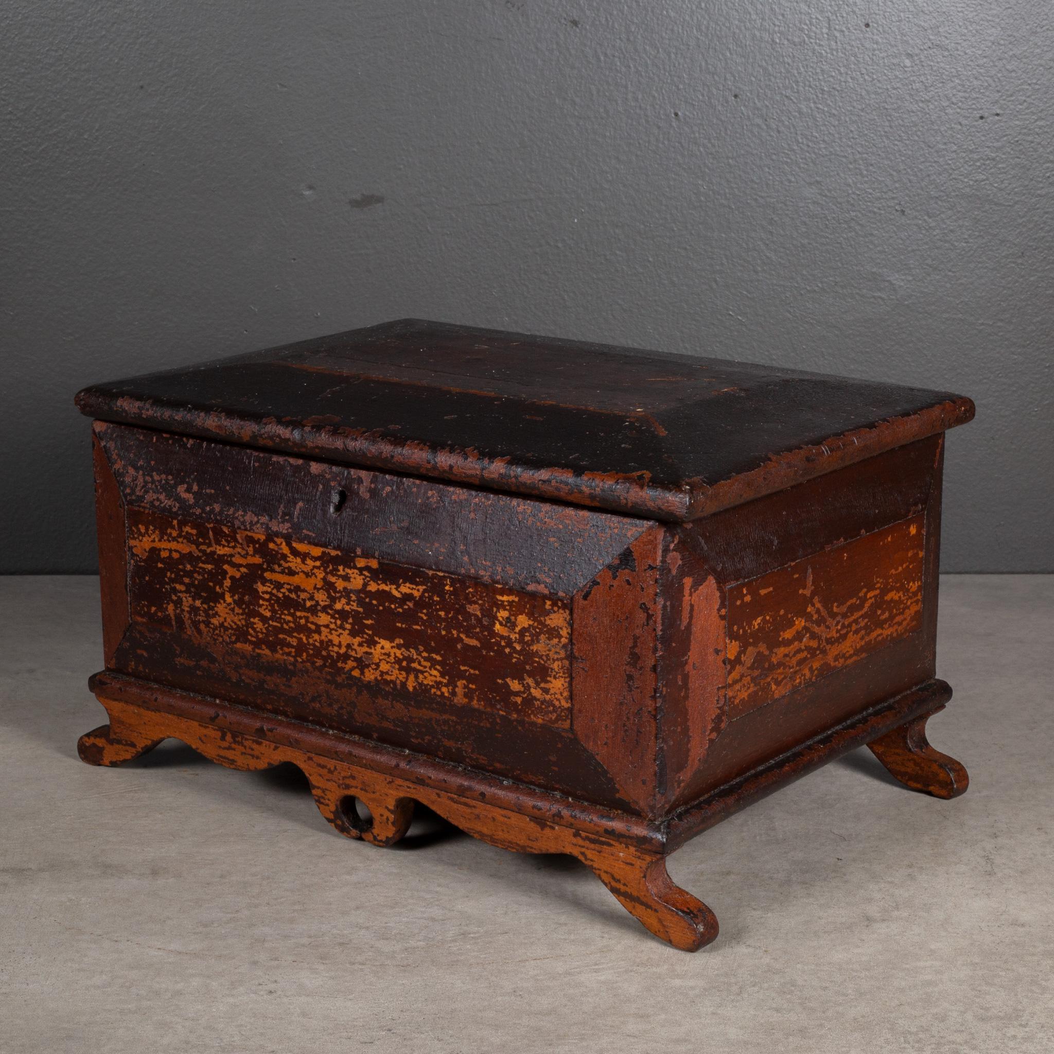 ABOUT

A 19th century distressed scroll-footed box with original velvet interior.

    CREATOR Unknown.
    DATE OF MANUFACTURE c.1800-1899. 
    MATERIALS AND TECHNIQUES Wood, Velvet. 
    CONDITION Good. Wear consistent with age and use. No key. 
