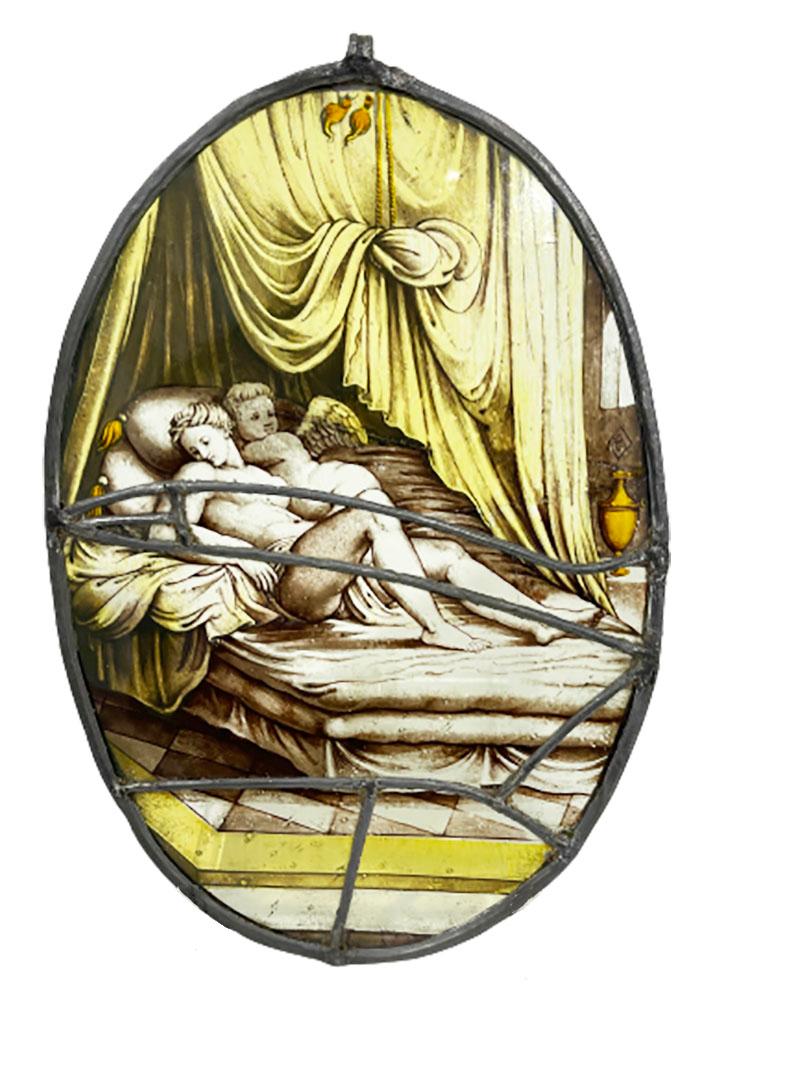 19th century Dutch oval fire-painted stained glass windows by Jan Schouten Delft

Serie of stained glass windows with a love scene of Psyche and Cupid, signed
When it is hung in the window shows the beautiful painting through the