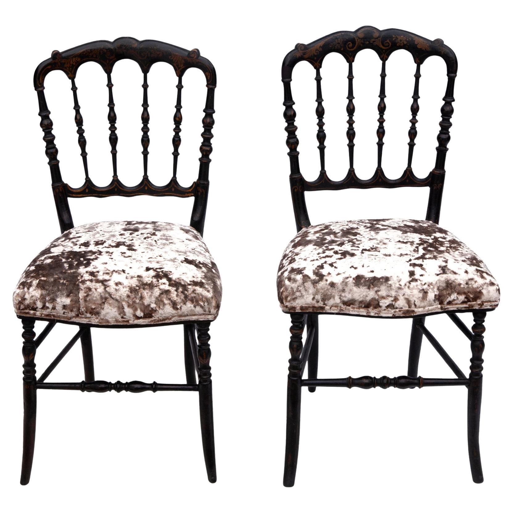 Original Napoleon lll ebonized charivari chairs.
Made in France, circa 1850's. 
Reupholstered in a warm rich taupe crushed velvet.
Seat height: 17.75 in (45 cm)
One of the pair is slightly smaller.