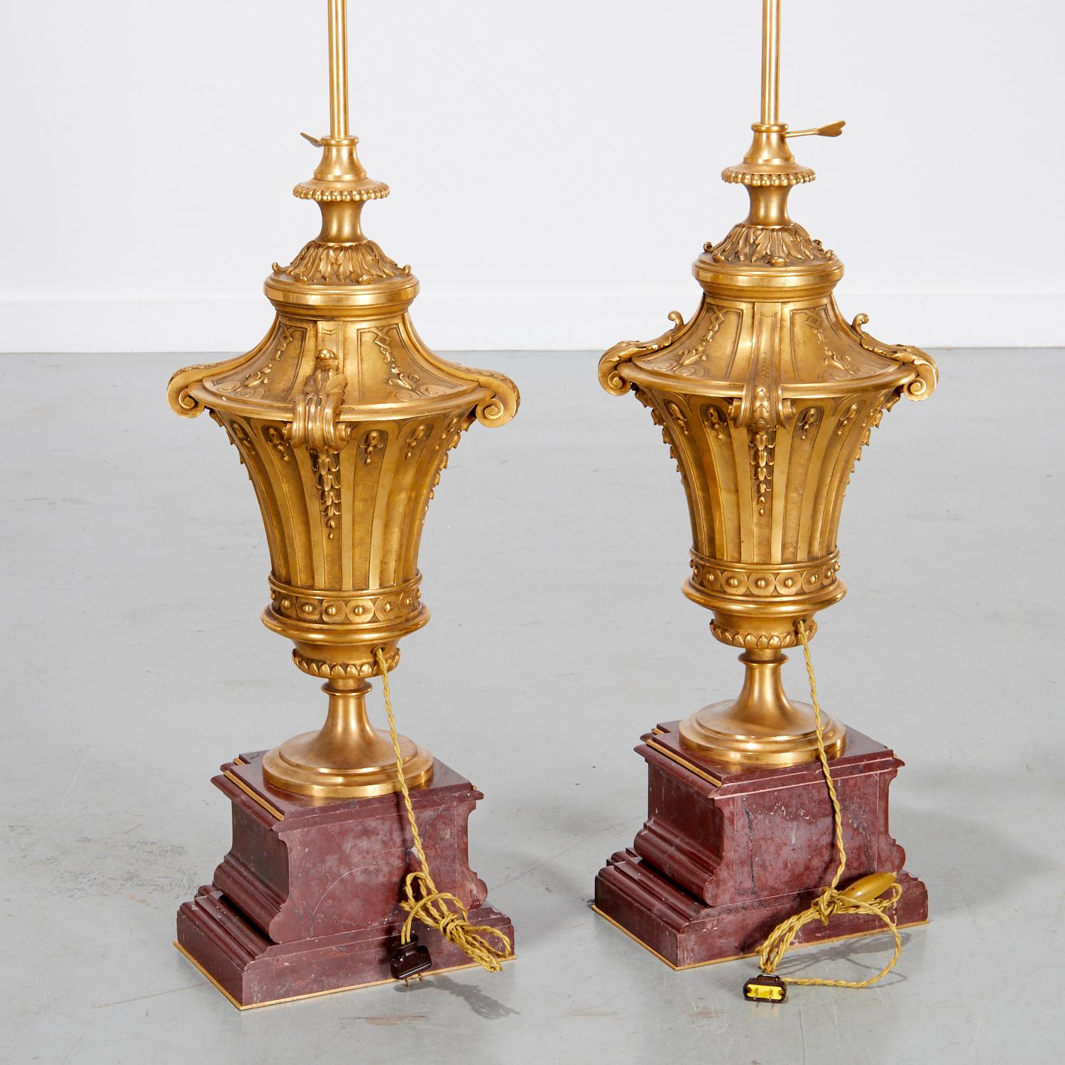 Attributed to E.F. Caldwell, Monumental Pair of Gilt Bronze and Rouge Royale Marble Lamps with Custom Shades, Late 19th Century

An extraordinary pair of monumental table lamps in the Louis XVI taste, attributed to the prestigious New York firm
