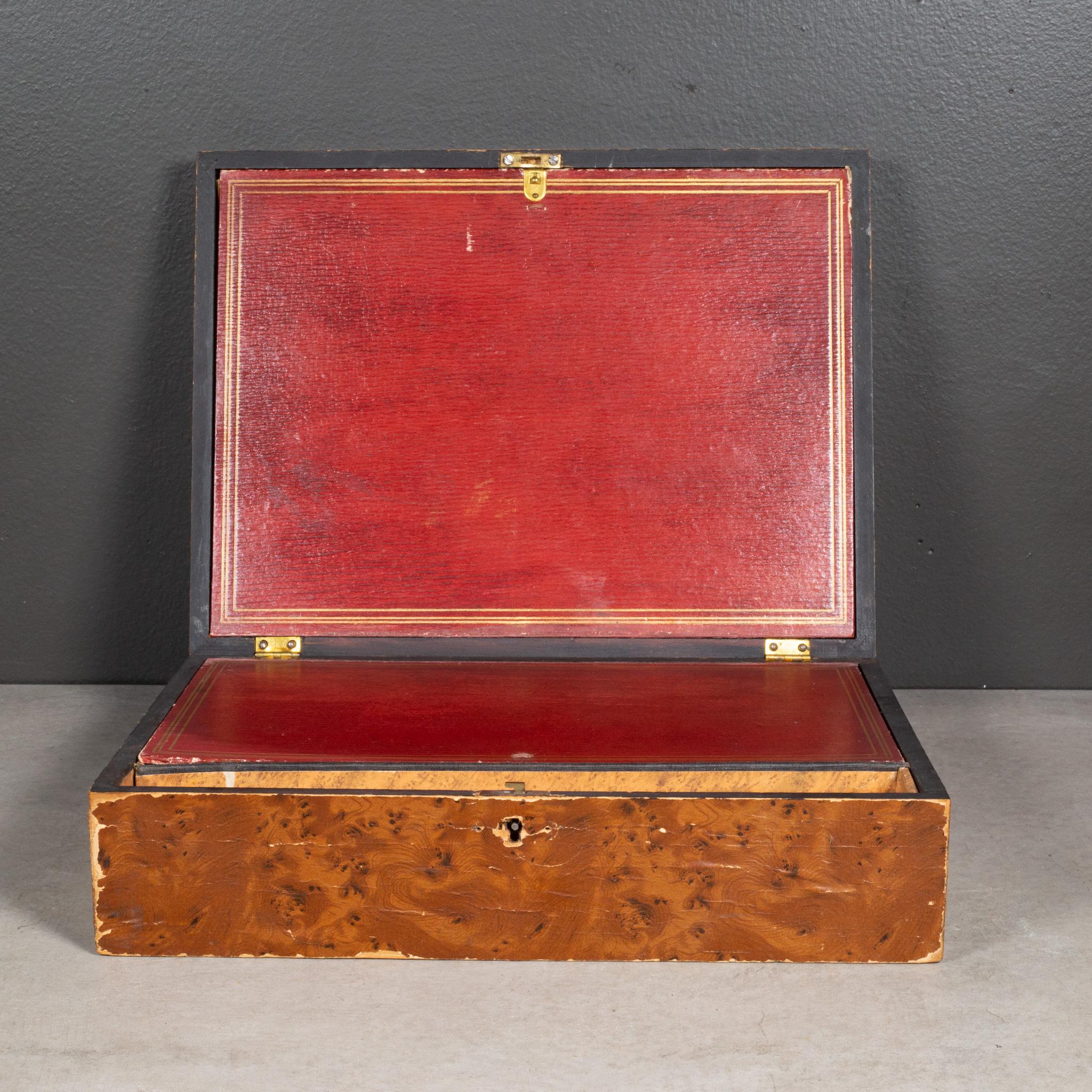 ABOUT

A 19th century pressed paper lap desk with an embossed and gilded stag decoration to top. Top and bottom open to reveal storage areas along with an area for writing instruments and creates a writing surface when closed. Several copies of rice