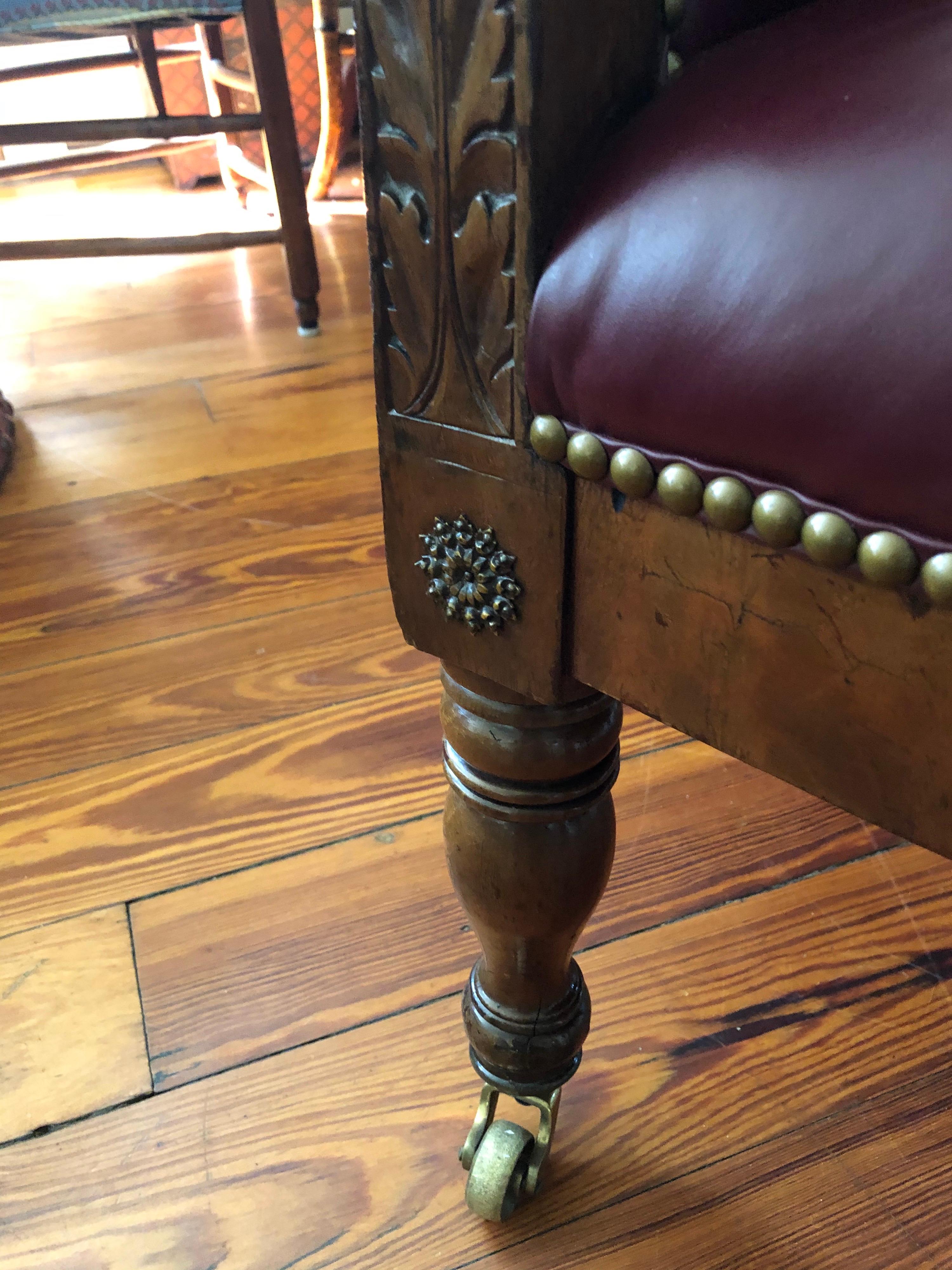 Mahogany 19th Century Empire Library Chair on Brass Casters In Good Condition For Sale In Hudson, NY