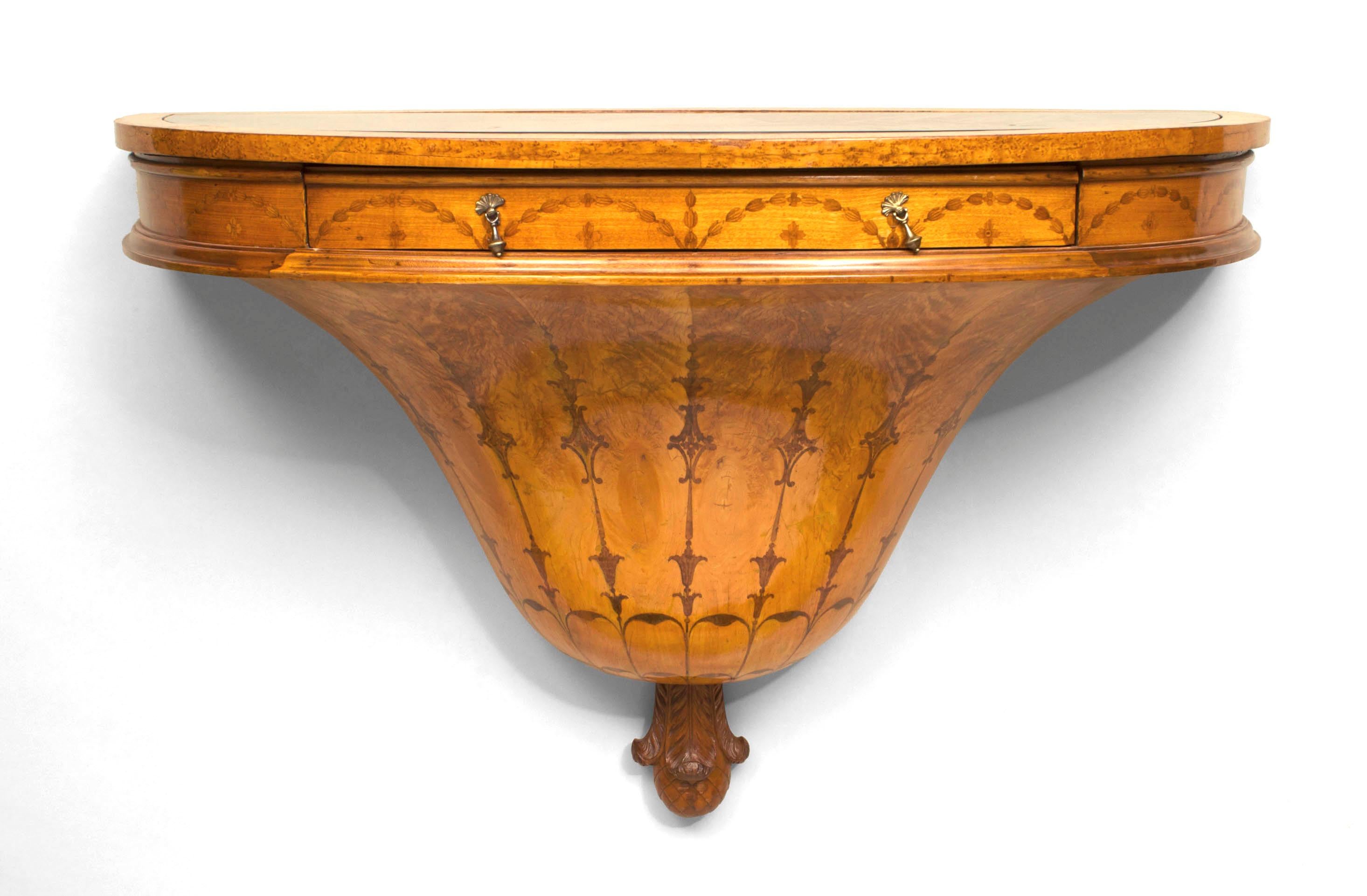 English Adam-style (19th Century) maple wall mounted bracket commode/console with walnut inlaid vine & trim with a single drawer and inset black glass top & carved finial base.
    